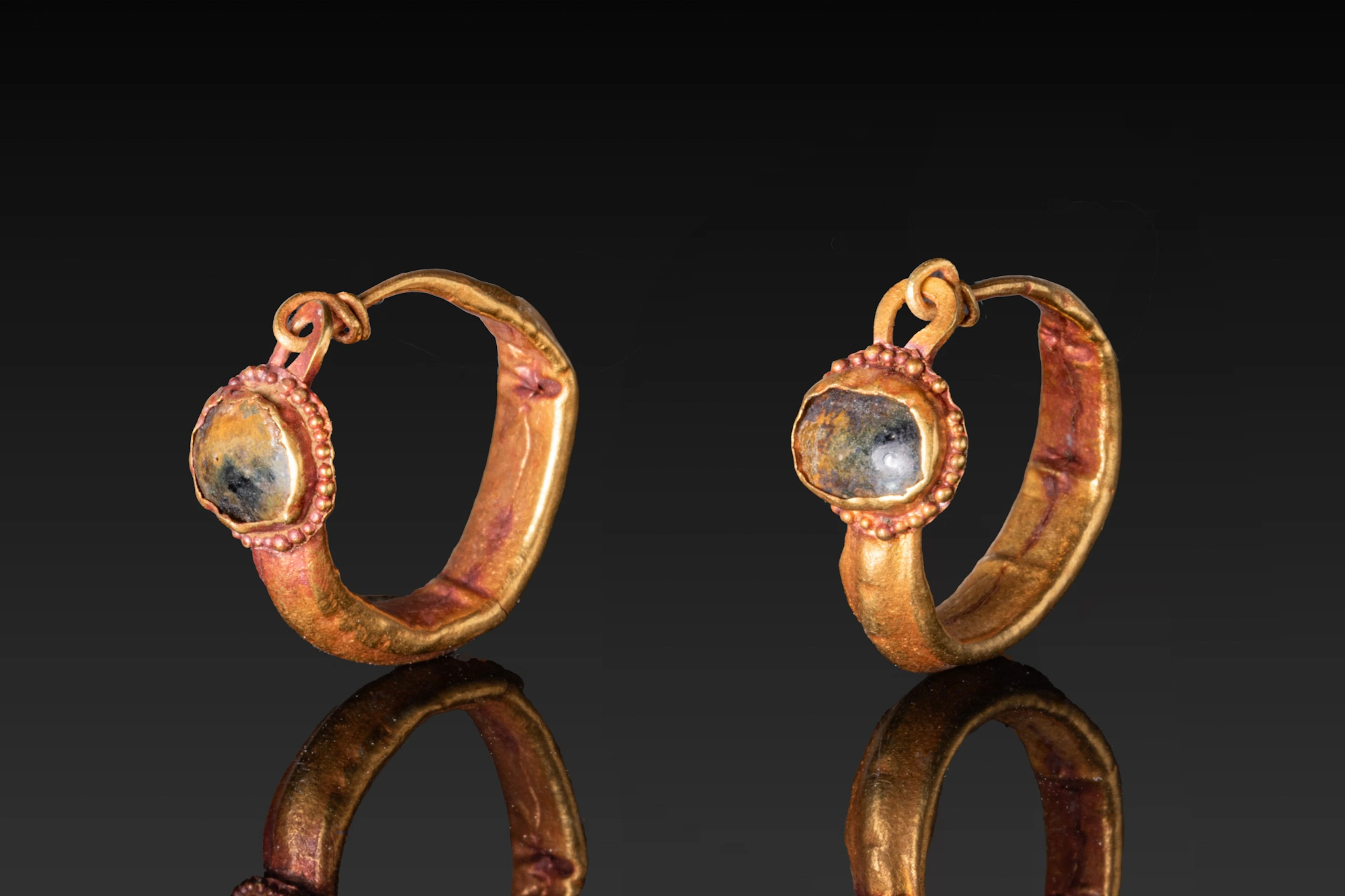 MATCHED PAIR OF ROMAN HIGH KARAT GOLD HOOP EARRINGS WITH CABOCHONS