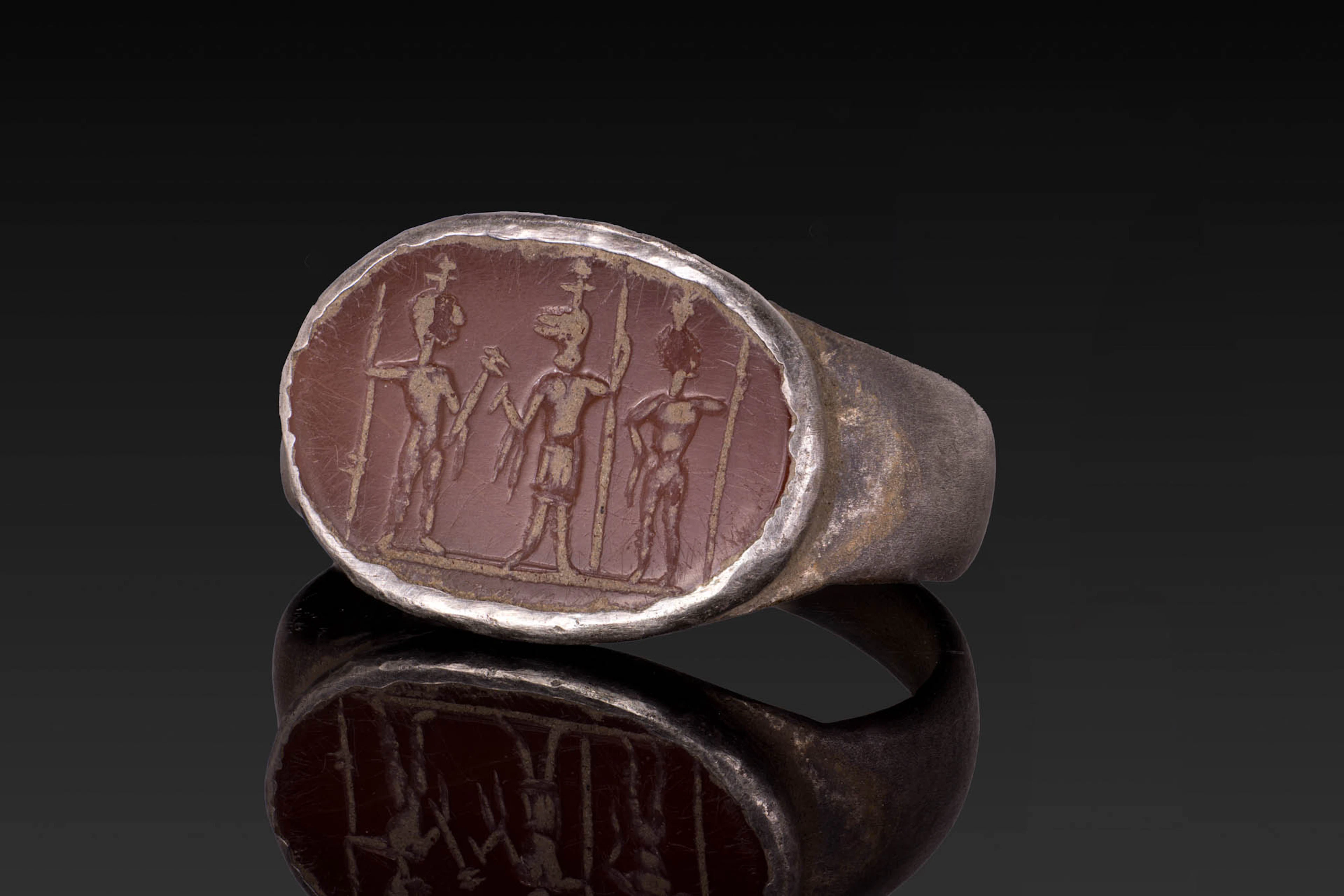 ROMAN CARNELIAN MAGICAL INTAGLIO OF ANUBIS AND DIOSCURI IN SILVER RING