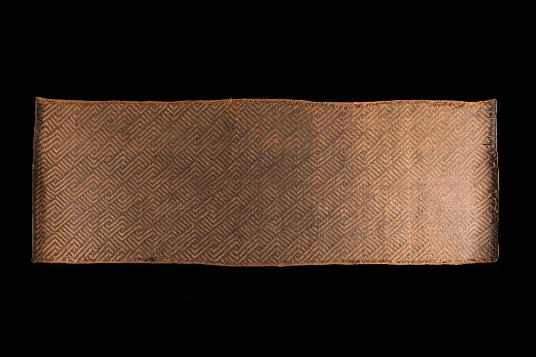 WOVEN MAT, POSSIBLY KUBA