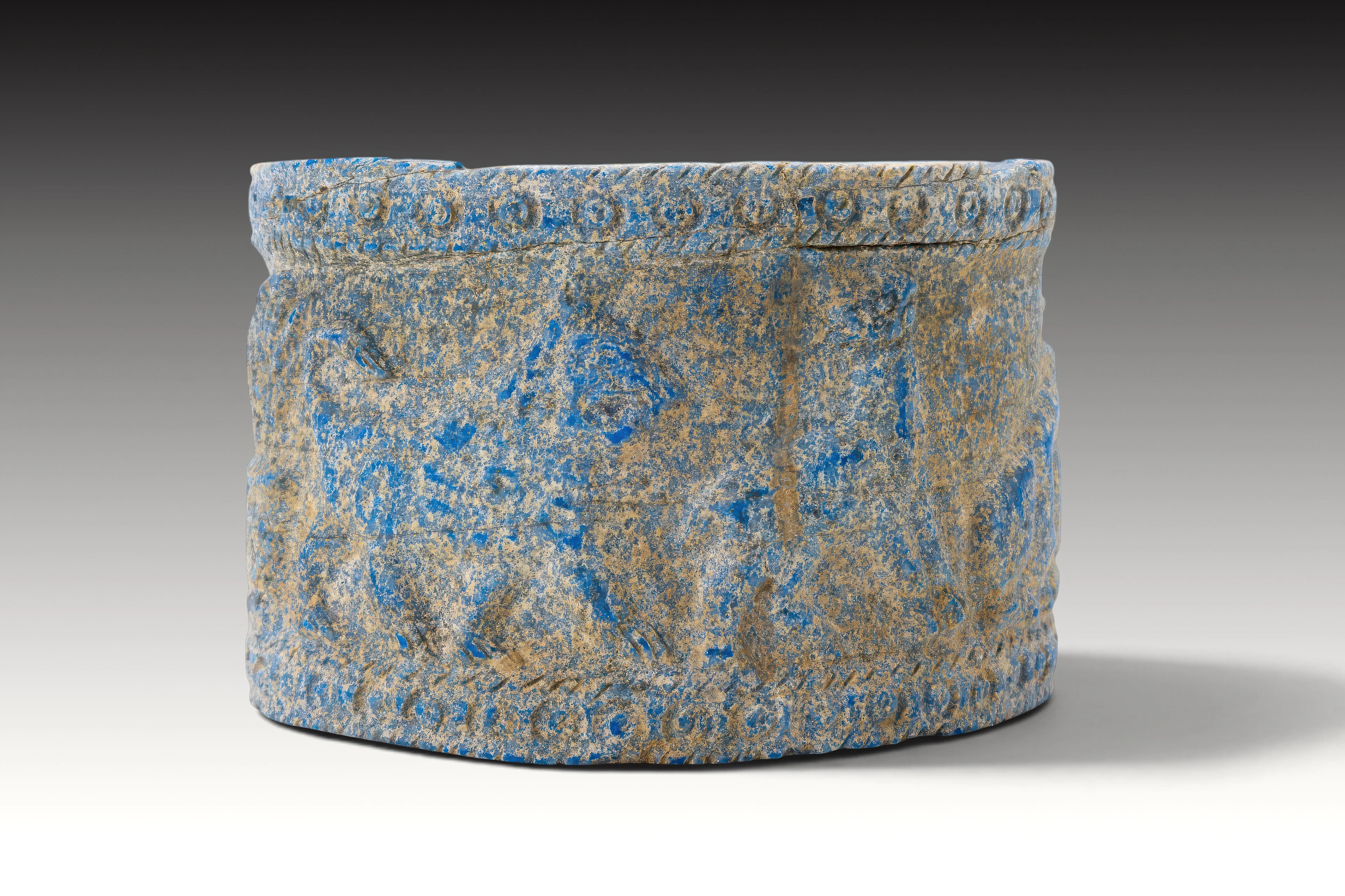 MESOPOTAMIAN LAPIS LAZULI PYXIS WITH ANIMALS AND TREES