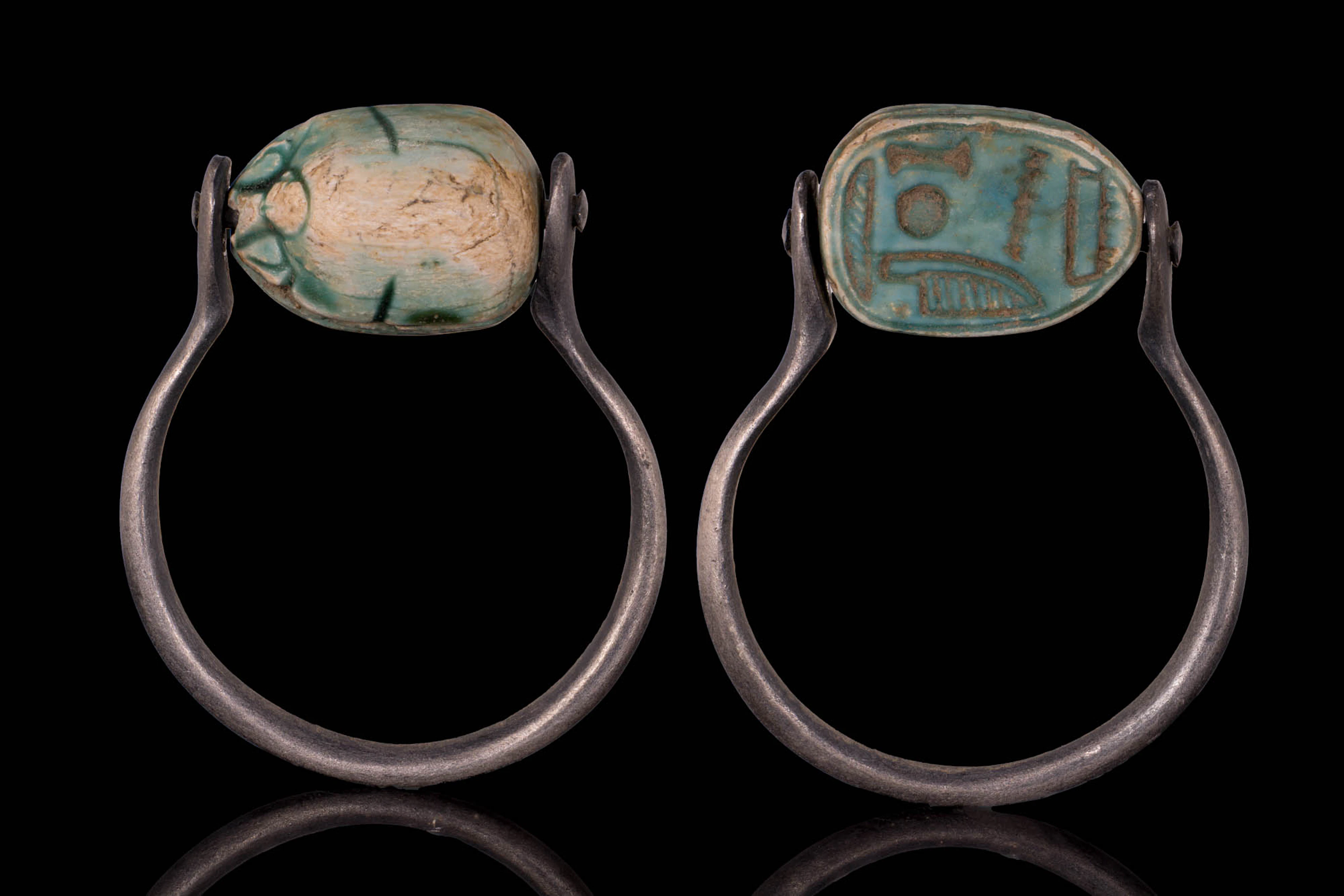 EGYPTIAN GLAZED STEATITE SCARAB WITH HIEROGLYPHIC INSCRIPTION IN SILVER RING