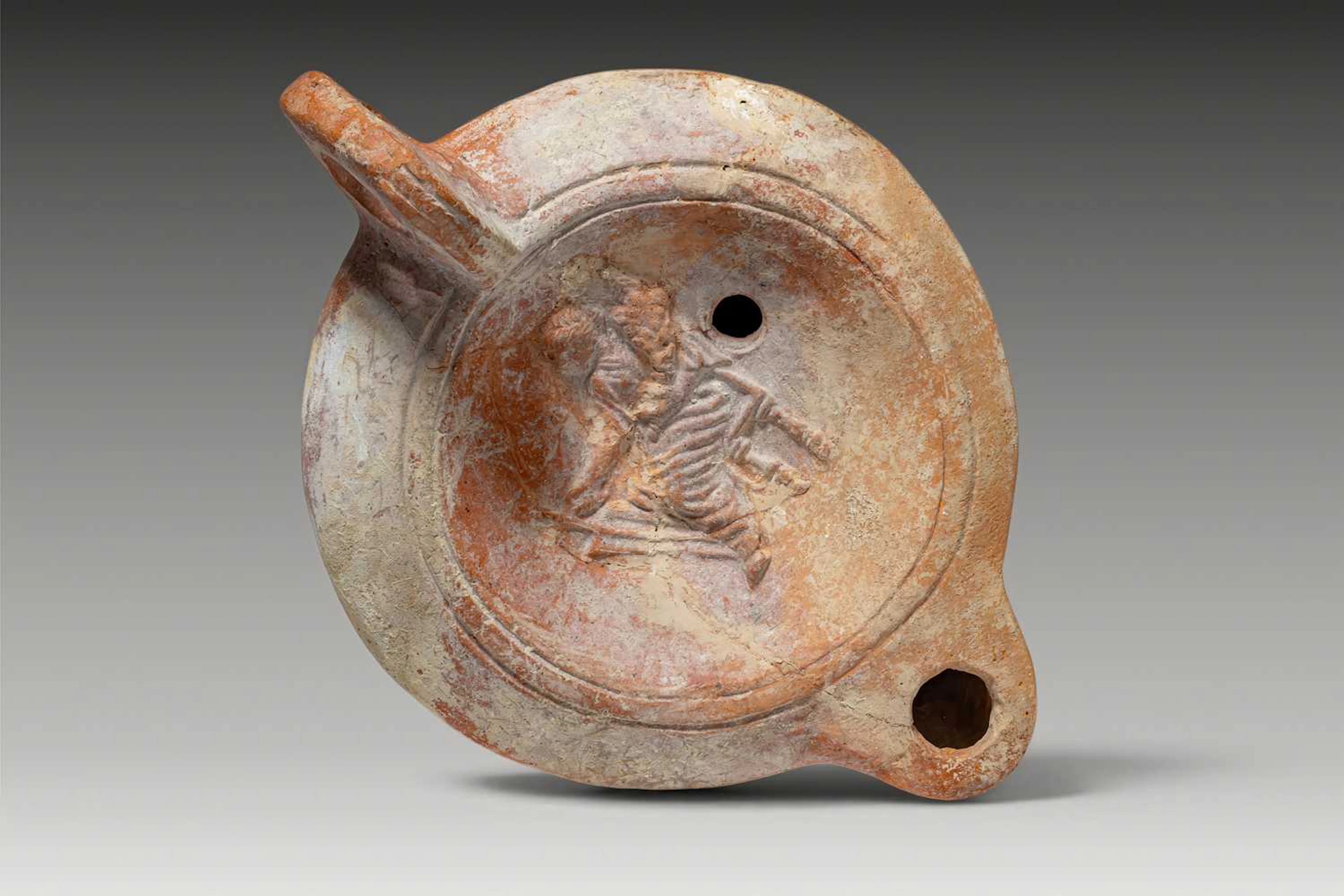 ROMAN TERRACOTTA OIL LAMP WITH SEATED FORTUNA