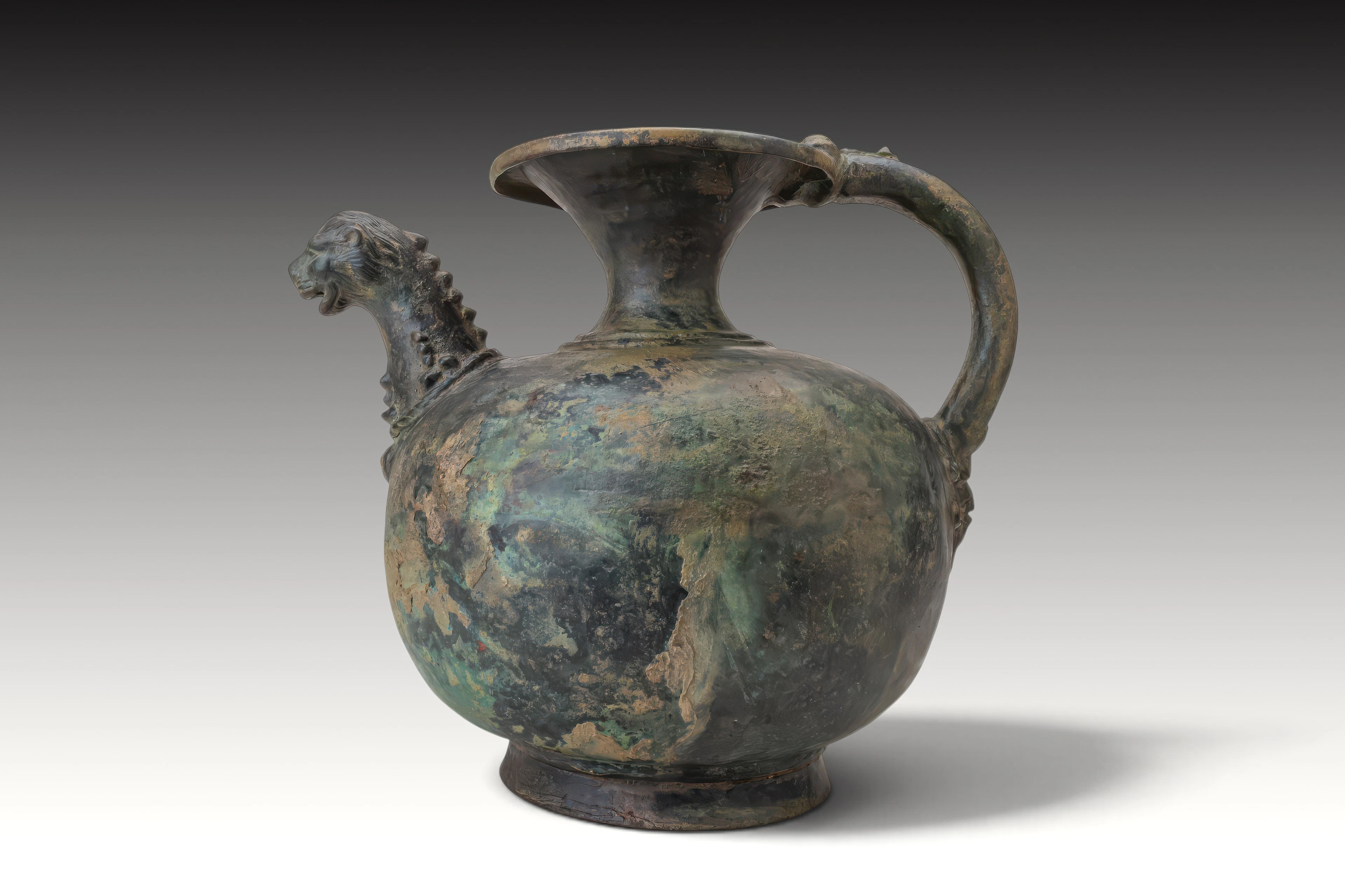 URARTIAN BRONZE JUG WITH LION-SHAPED SPOUT