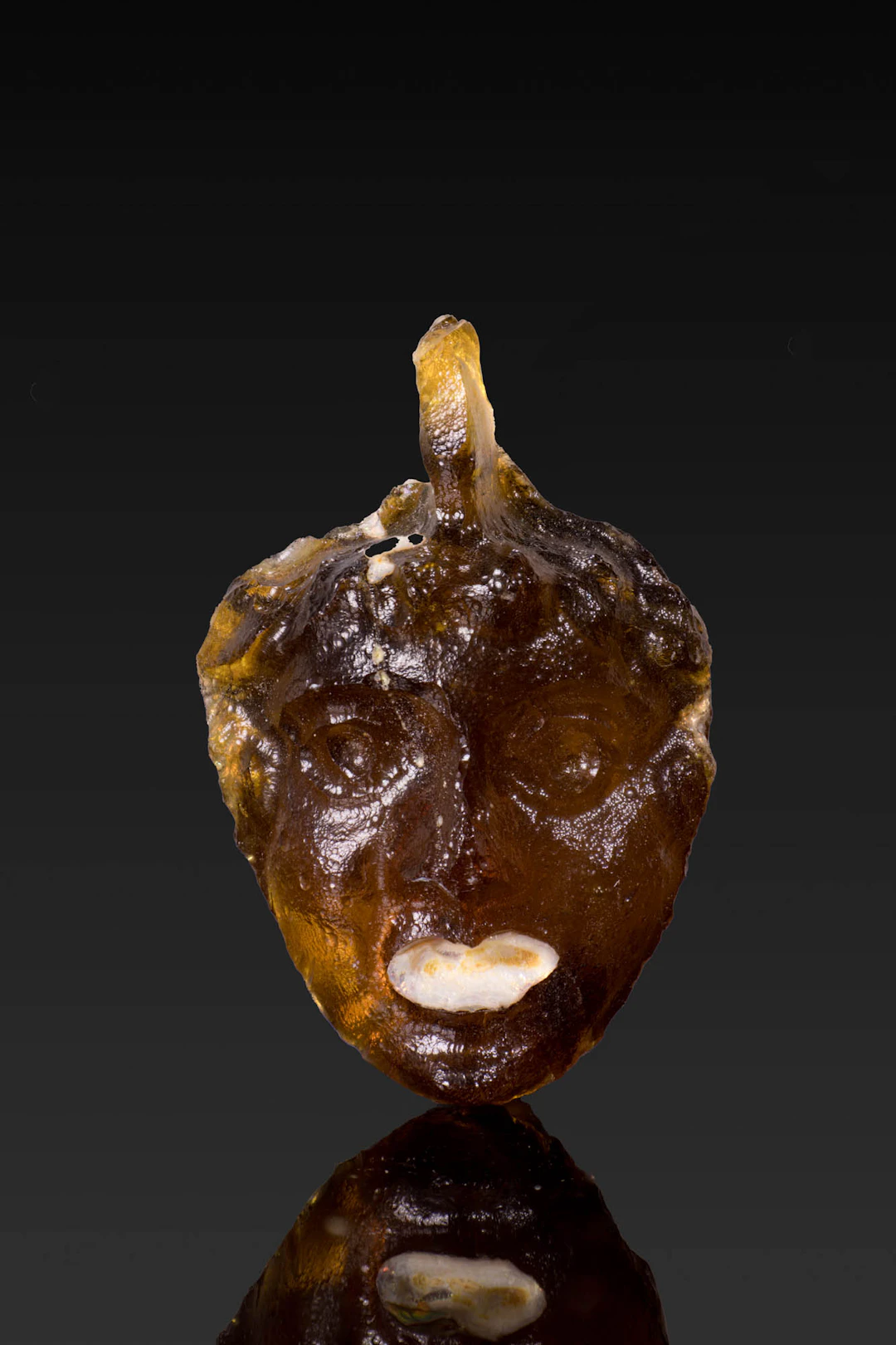 RARE ROMAN GLASS THEATRICAL MASK PENDANT