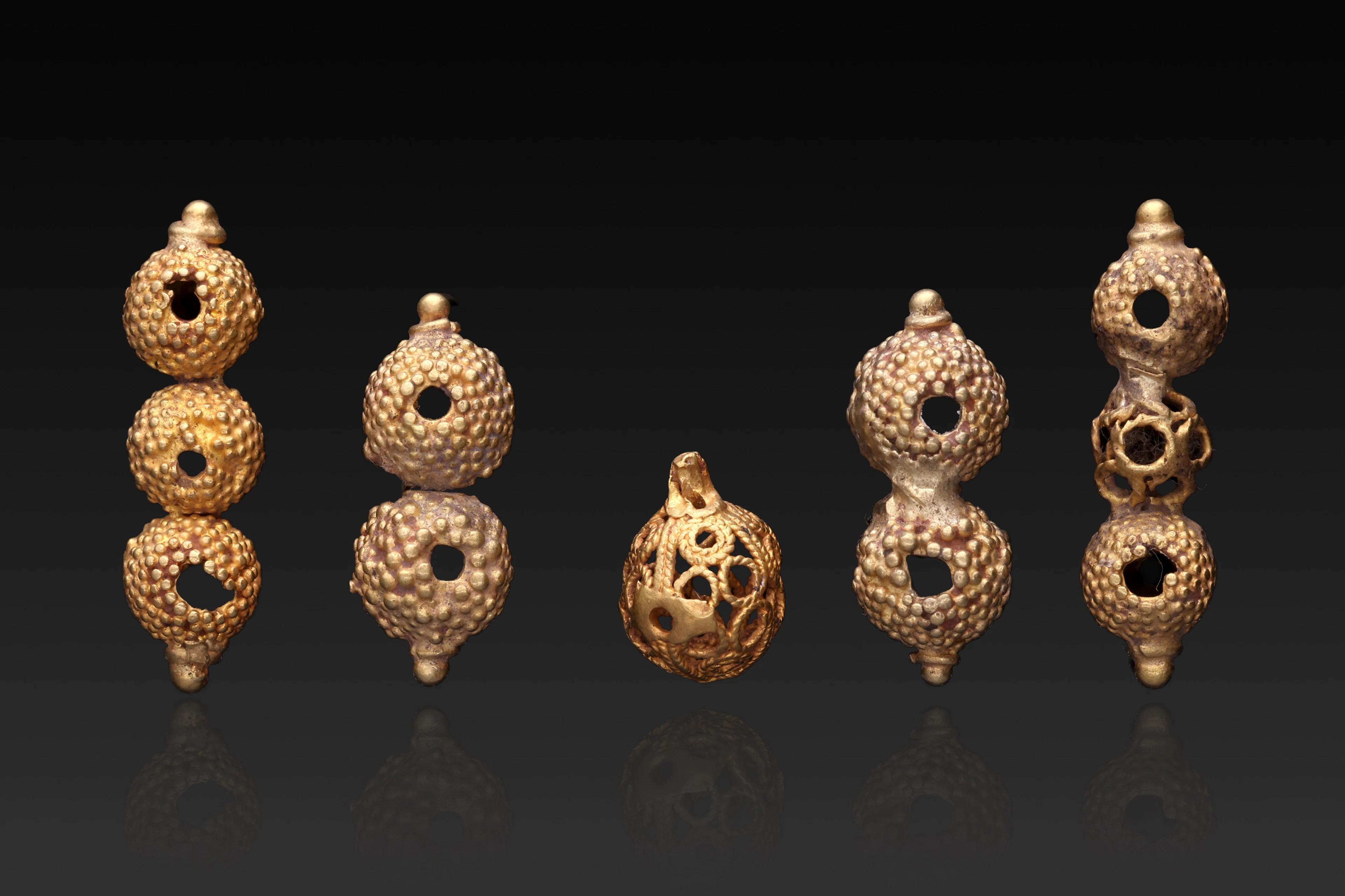 COLLECTION OF GREEK GOLD PENDANTS