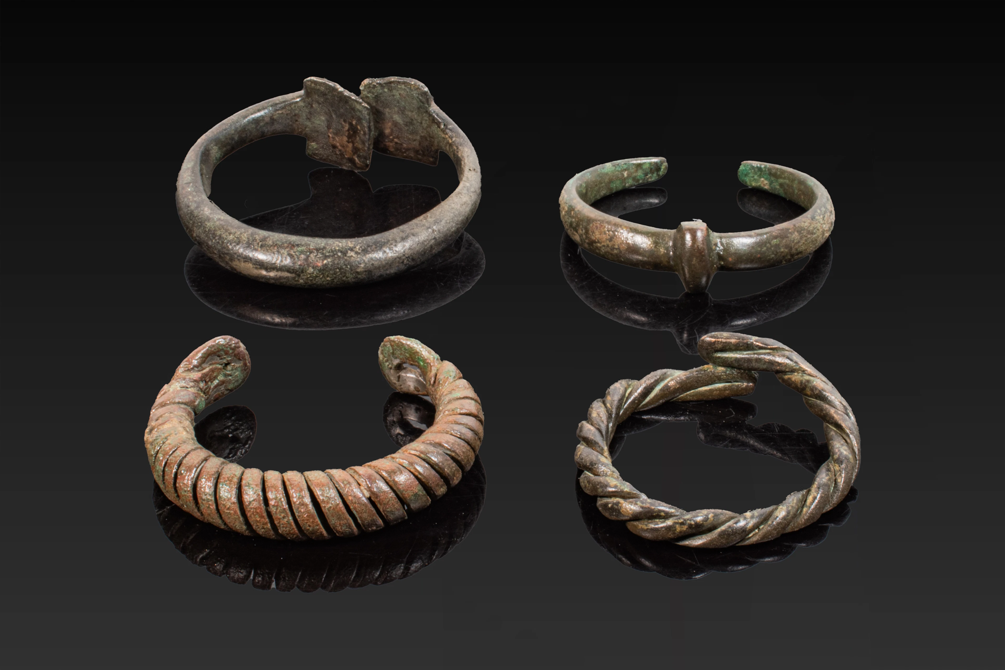 COLLECTION OF CELTIC BRONZE BANGLES