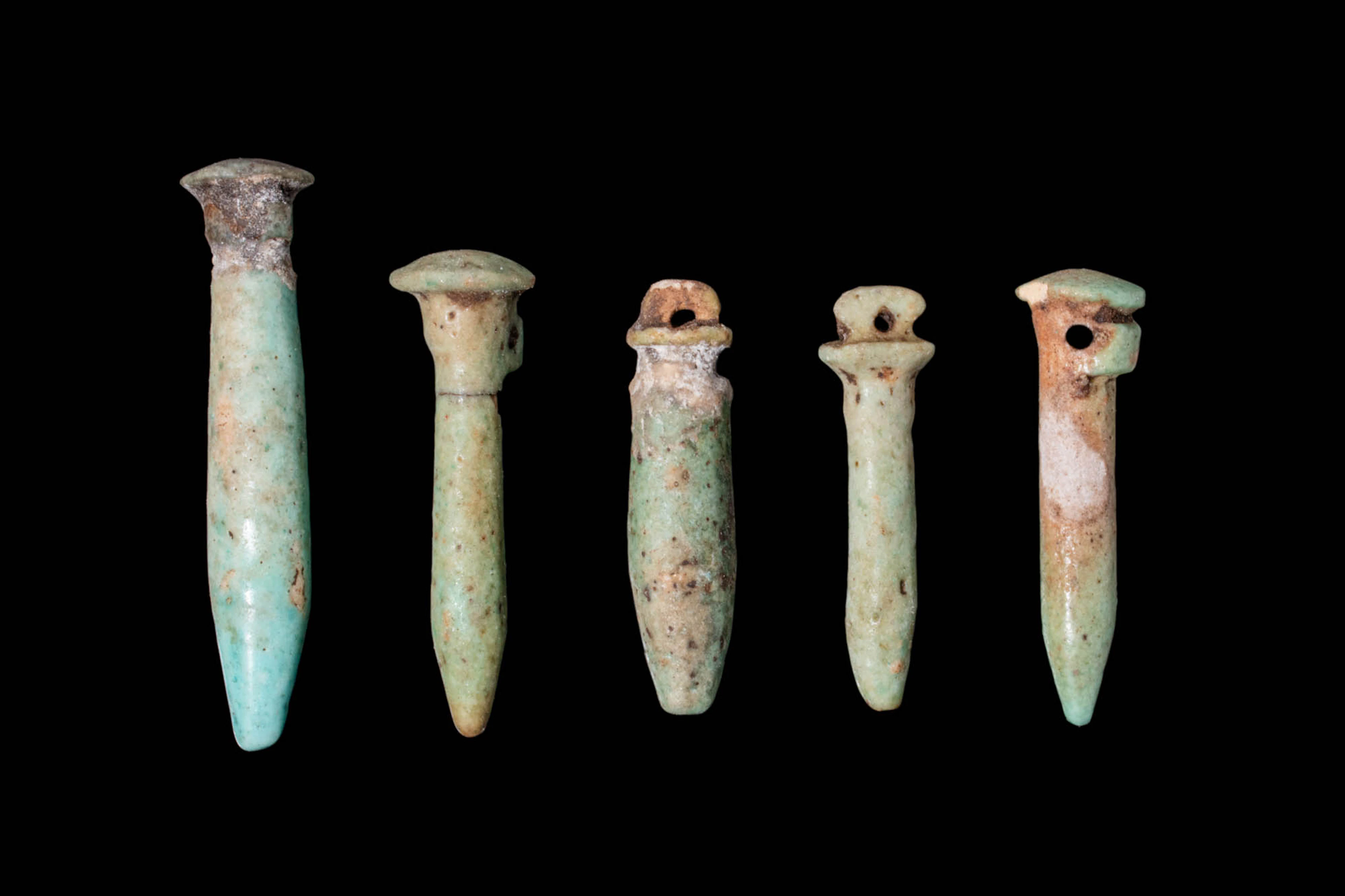 COLLECTION OF EGYPTIAN FAIENCE PAPYRUS COLUMN AMULETS