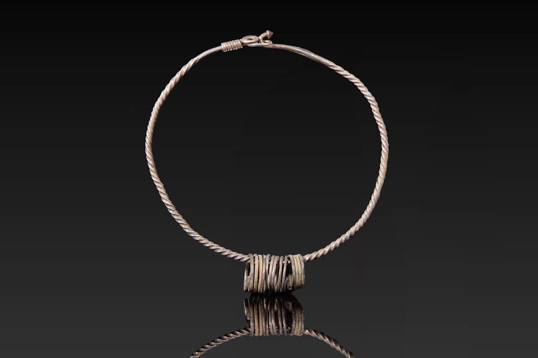 VIKING SILVER TORQUE WITH COILED PENDANT