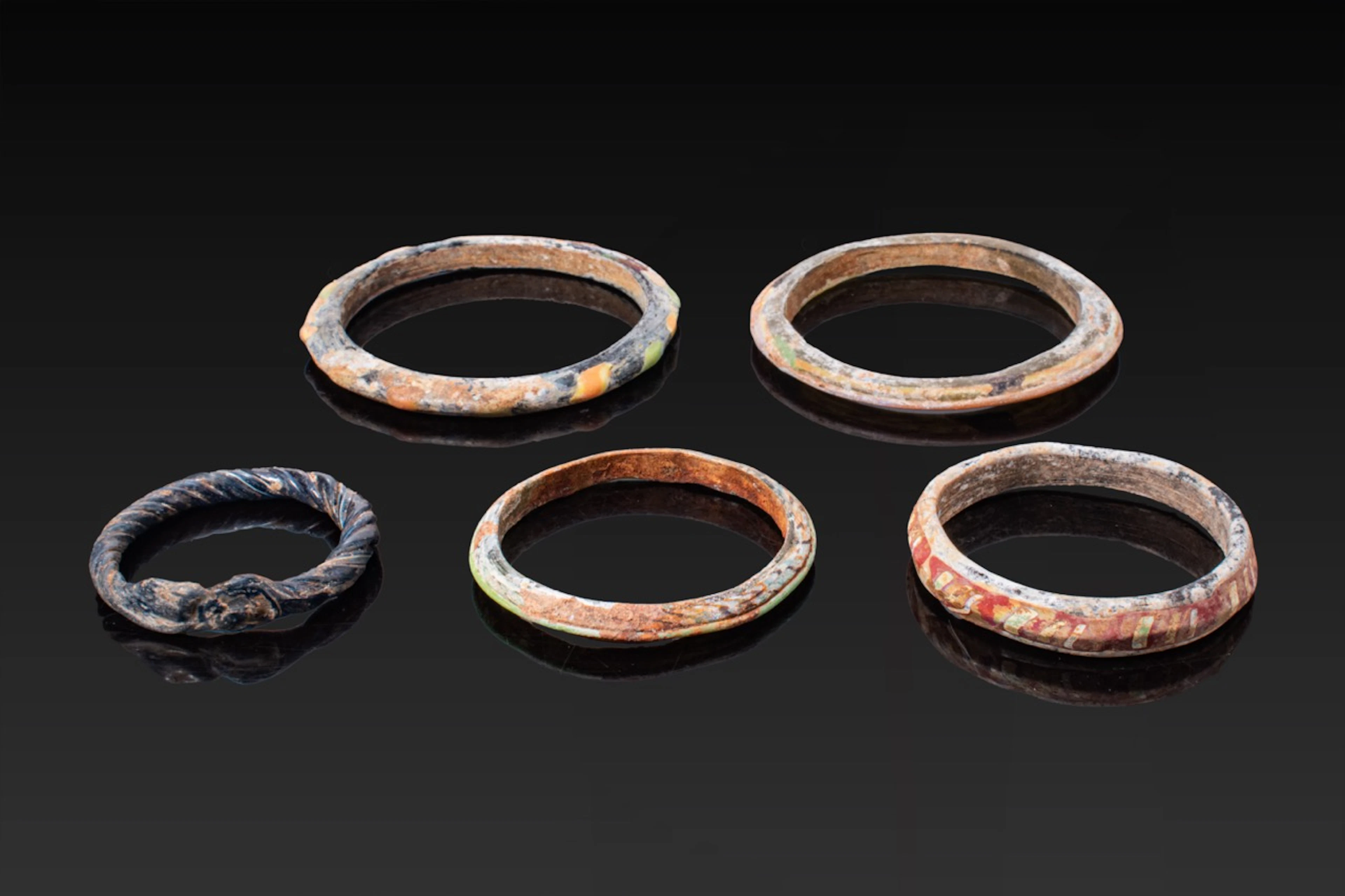 COLLECTION OF ROMAN POLYCHROME GLASS BANGLES
