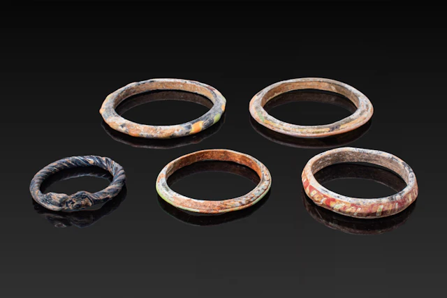 COLLECTION OF ROMAN POLYCHROME GLASS BANGLES