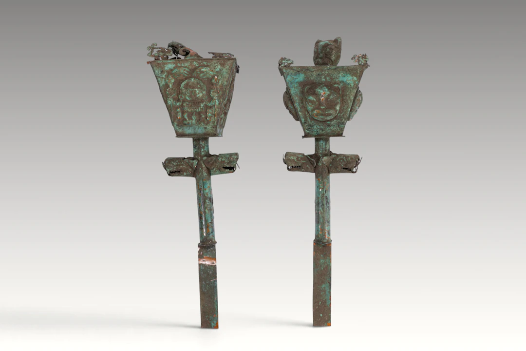 PAIR OF MOCHE COPPER CEREMONIAL SCEPTRES
