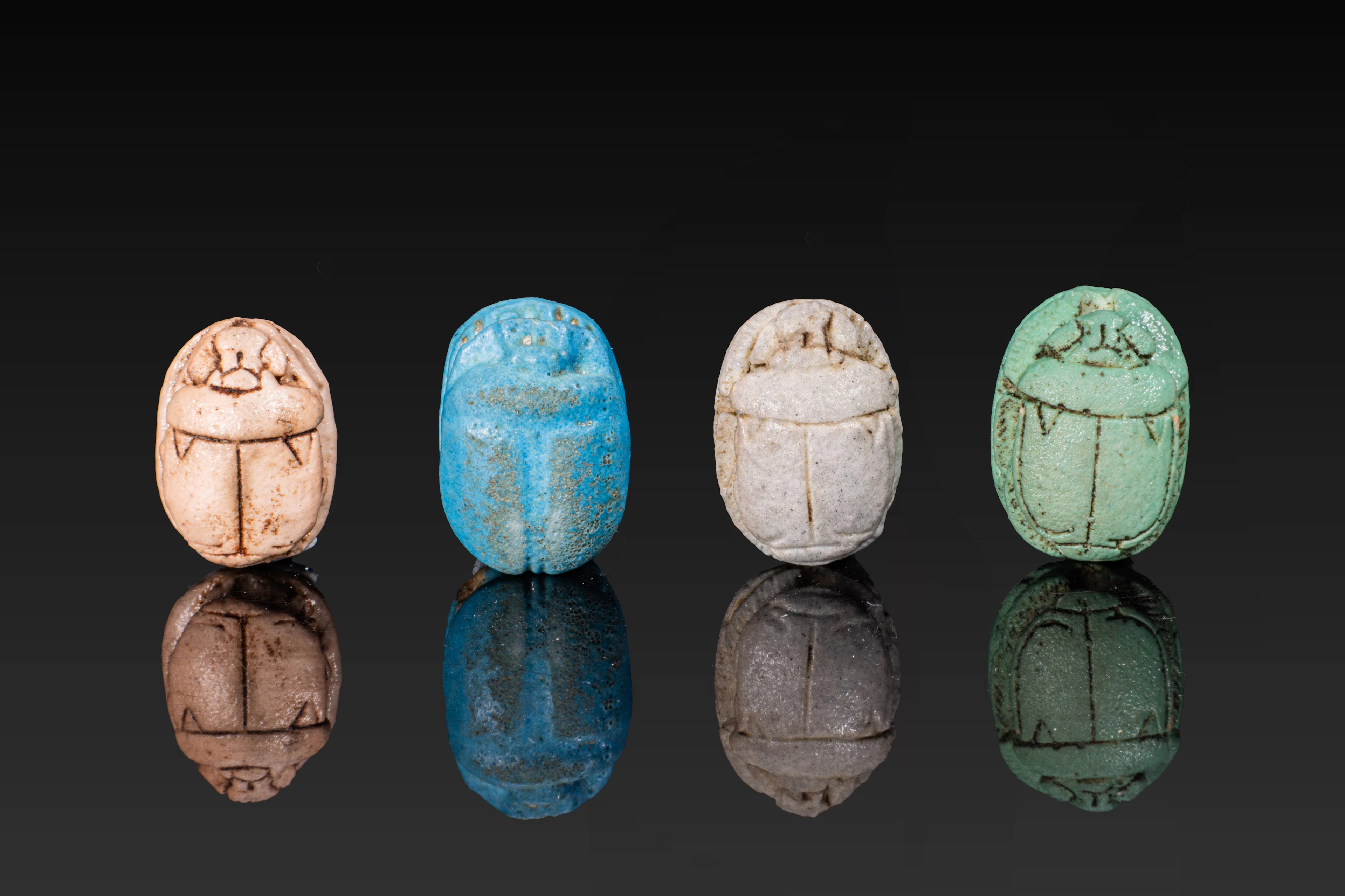COLLECTION OF EGYPTIAN FAIENCE SCARABS