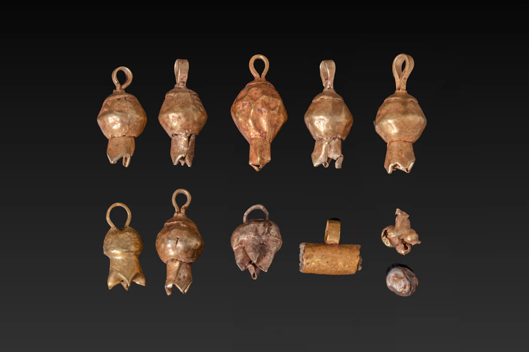 COLLECTION OF CYPRIOT GOLD POMEGRANATE PENDANTS