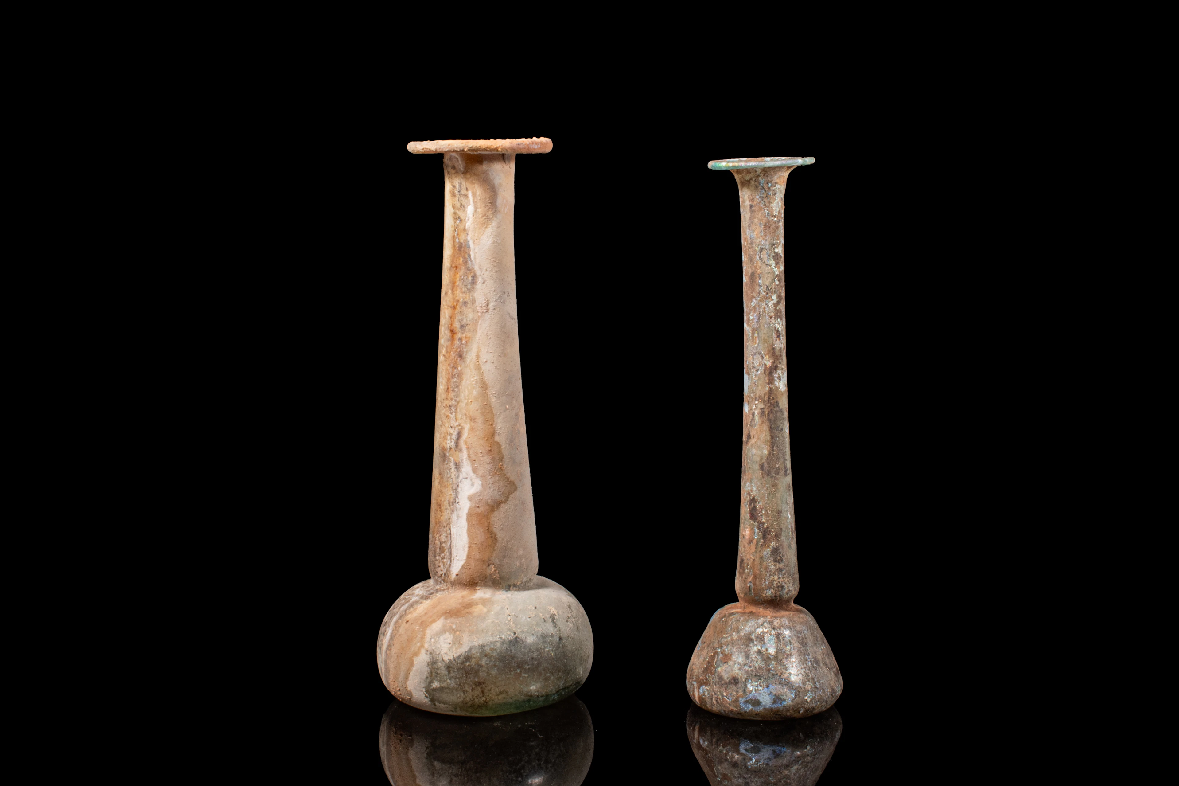 PAIR OF LARGE ROMAN GLASS UNGUENTARIA