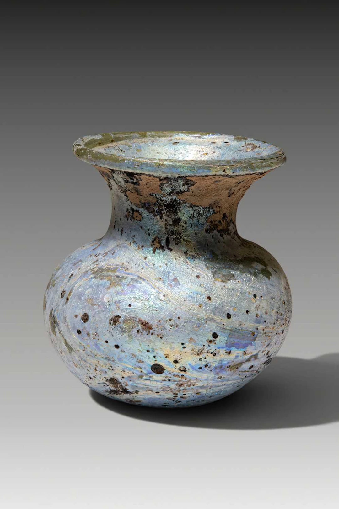 ROMAN GLASS UNGUENTARIUM WITH RARE IRIDESCENCE