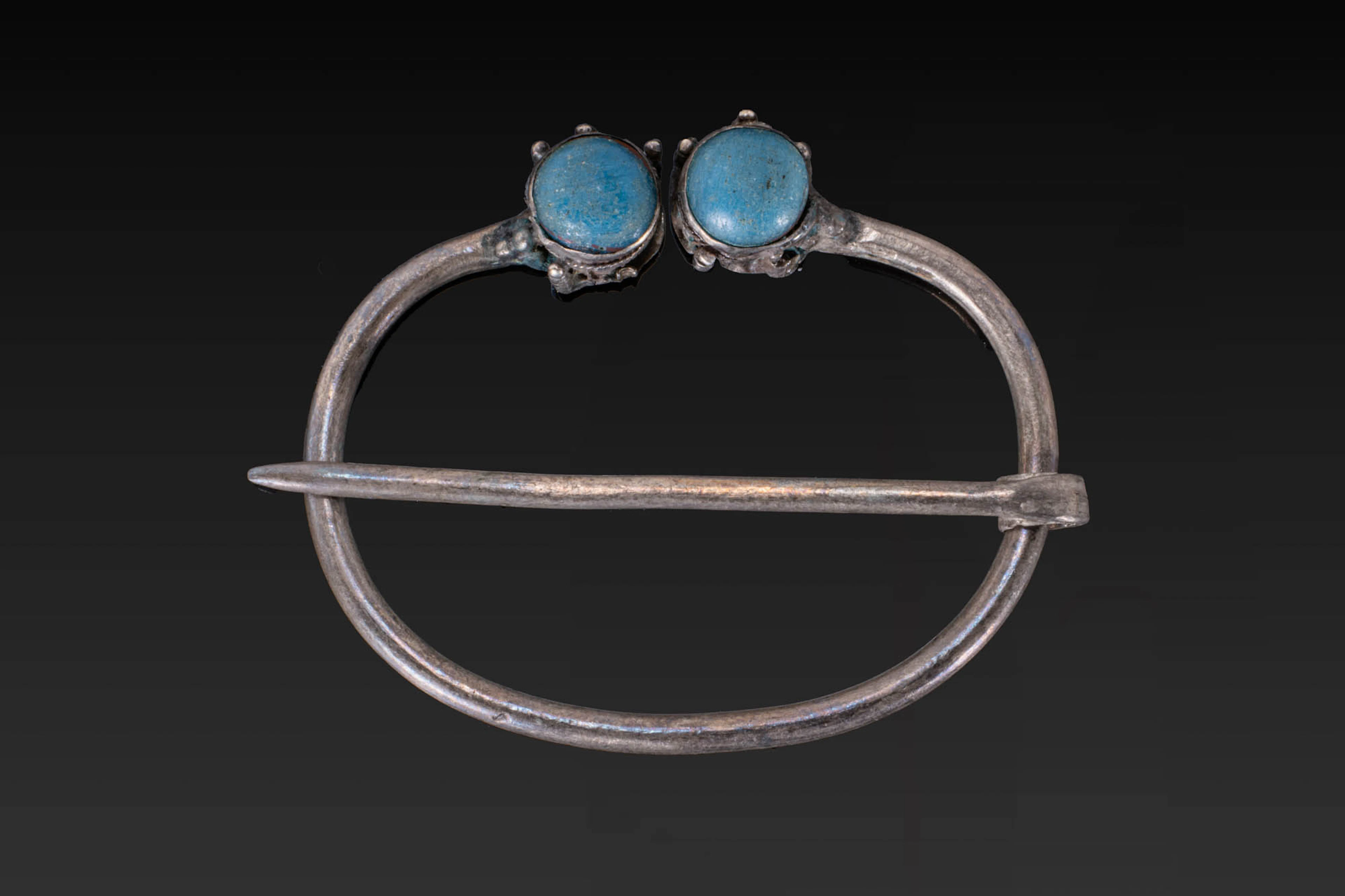 VIKING SILVER PENANNULAR BROOCH WITH TWO TURQUOISE CABOCHONS
