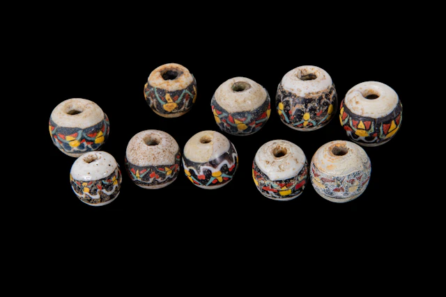 COLLECTION OF ROMAN MOSAIC GLASS BEADS WITH GEOMETRIC MOTIFS