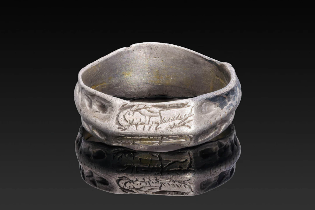 BRITISH SILVER ICONOGRAPHIC RING