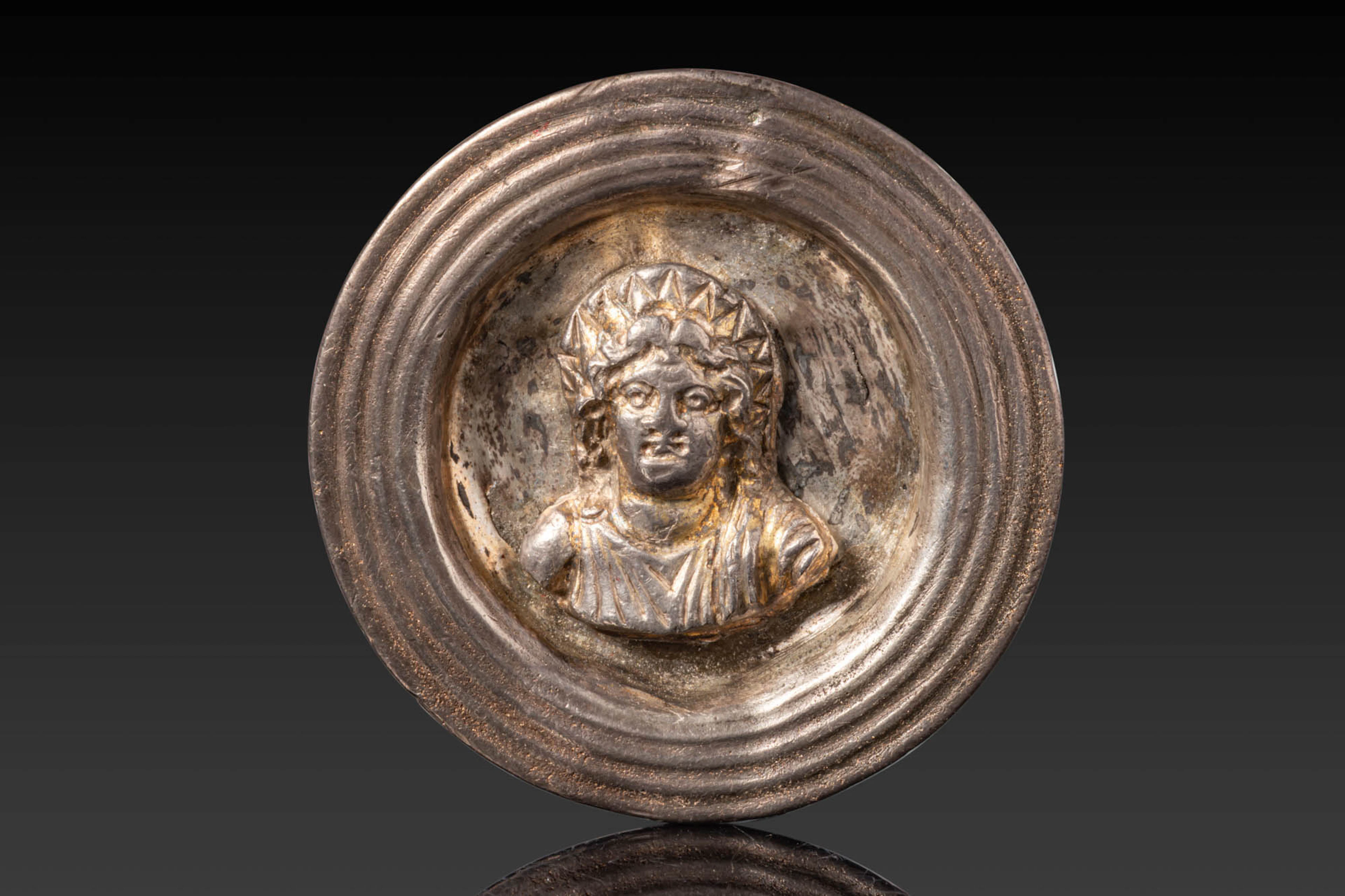 ROMAN SILVER-GILT PHALERA DEPICTING SOL INVICTUS