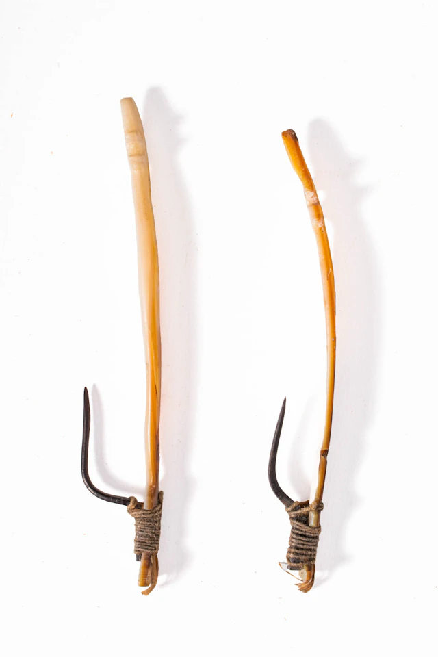 TWO OCEANIC FISH HOOKS