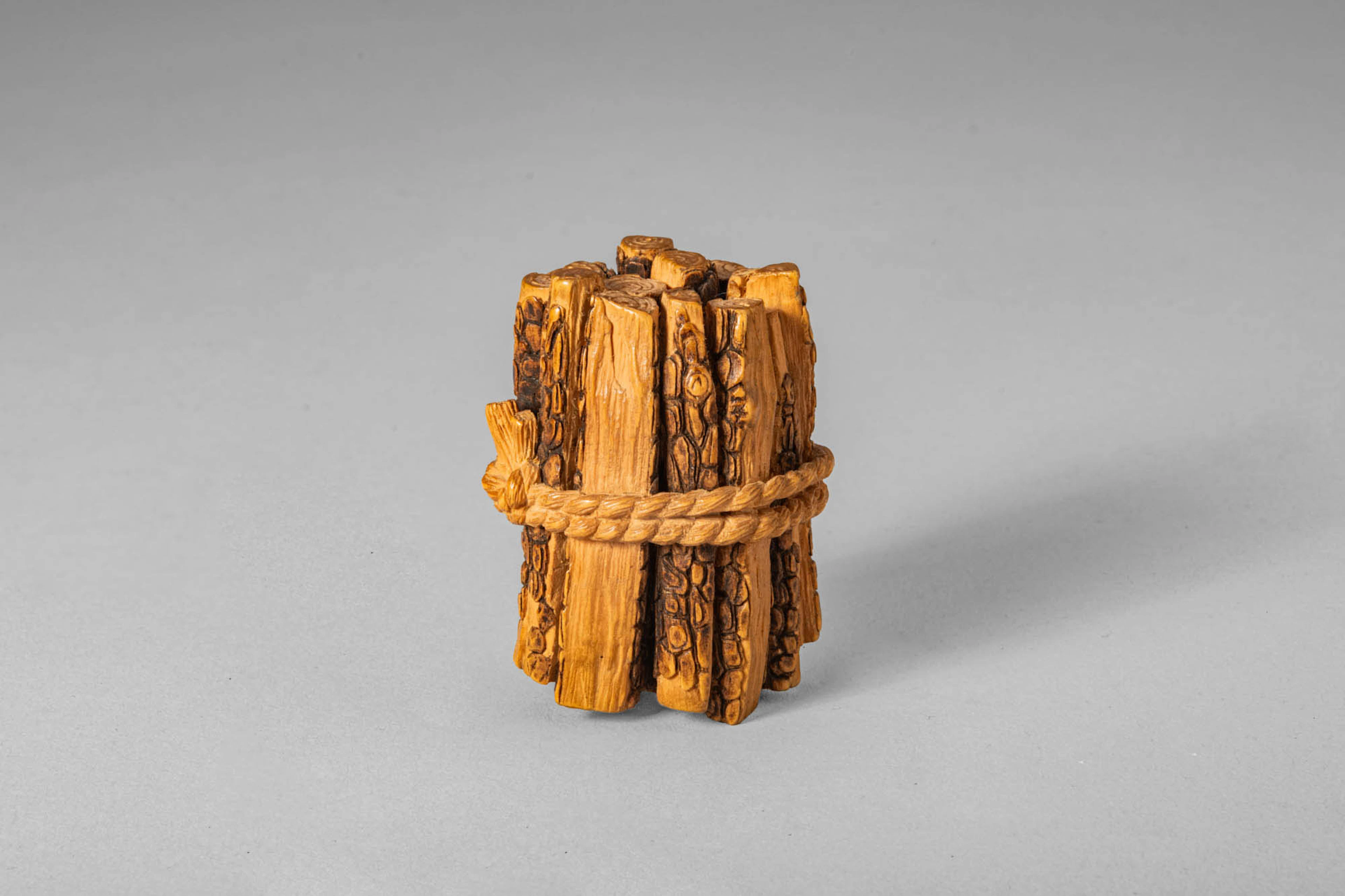 JAPANESE NETSUKE OF A BUNDLE OF LOGS, BY MORITA SOKO