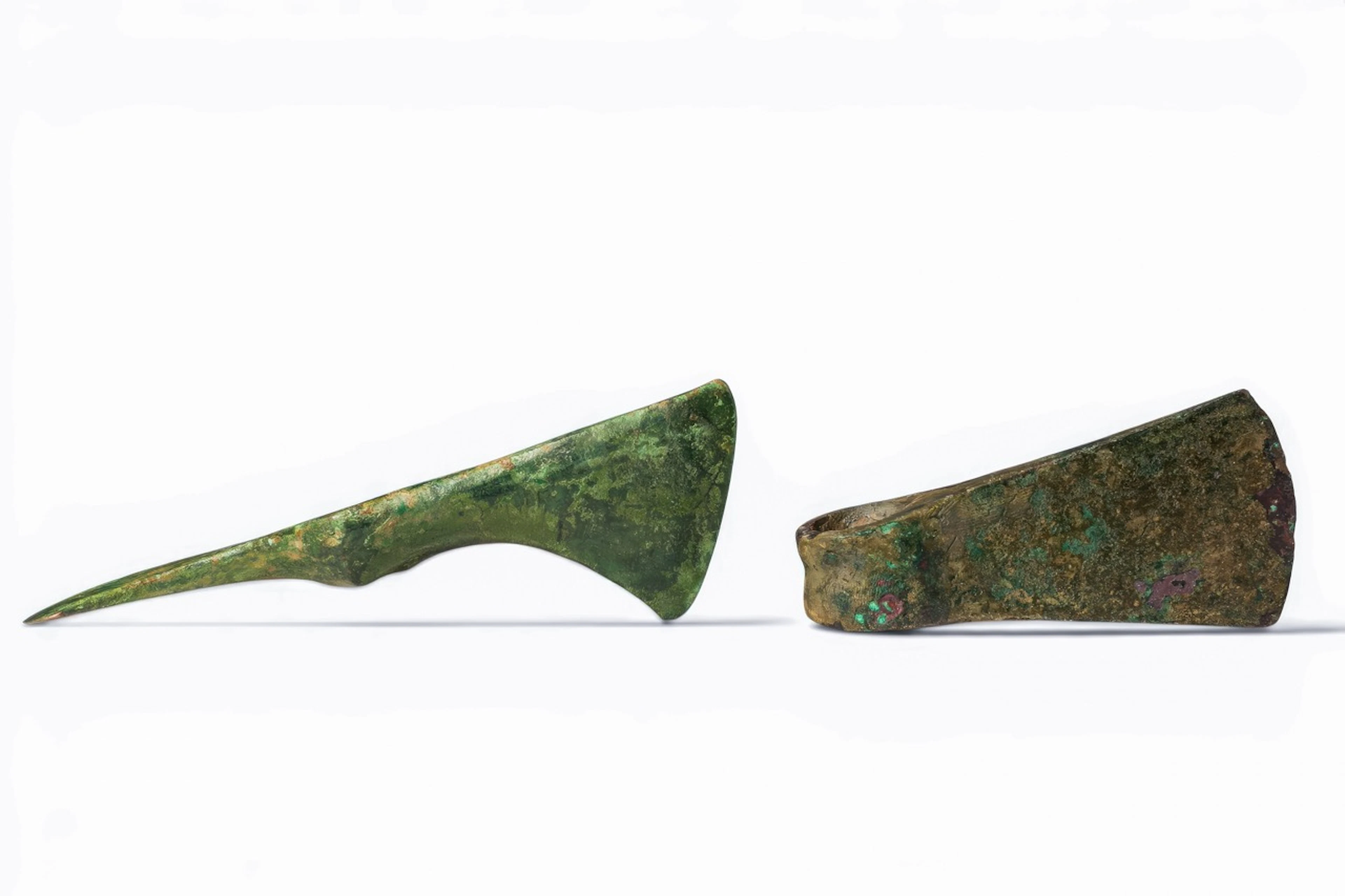 PAIR OF BRONZE AGE BRONZE AXE HEADS
