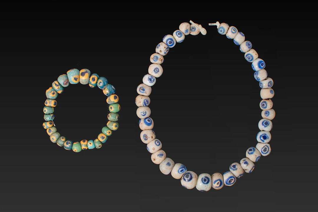 COLLECTION OF GRAECO-PHOENICIAN GLASS EYE BEADS