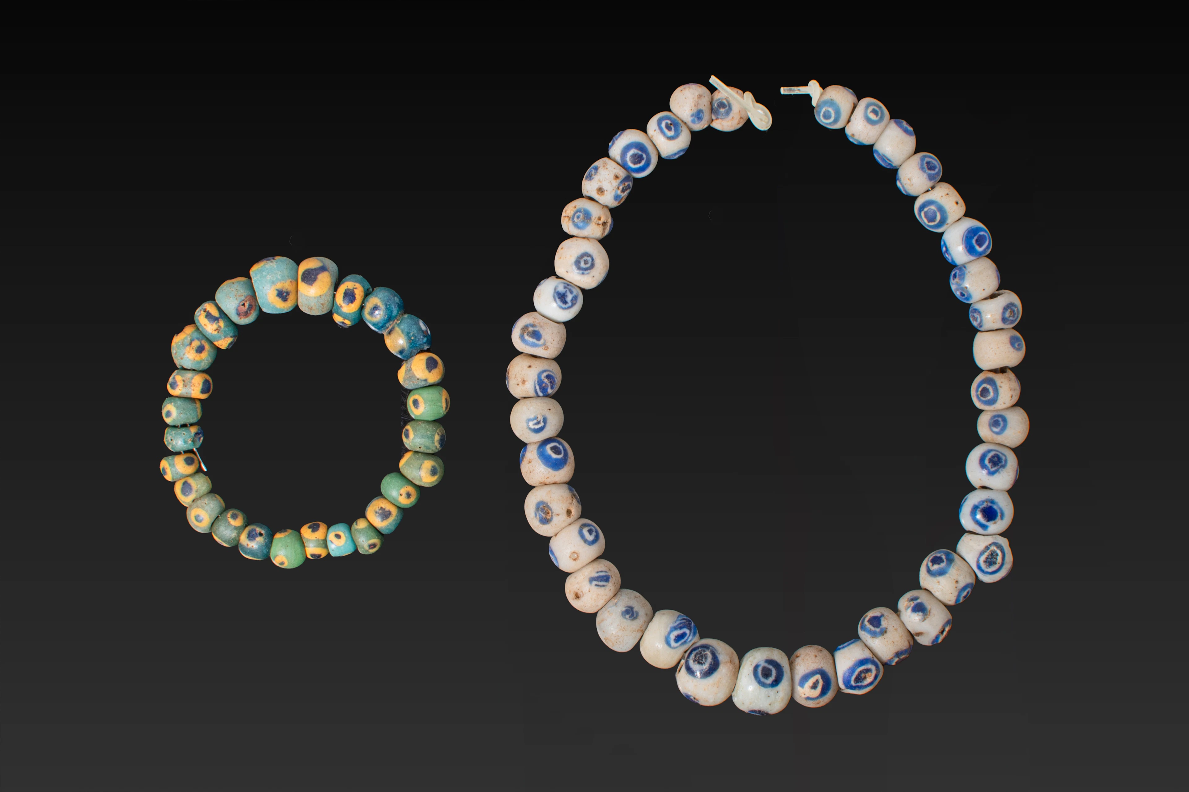 COLLECTION OF GRAECO-PHOENICIAN GLASS EYE BEADS