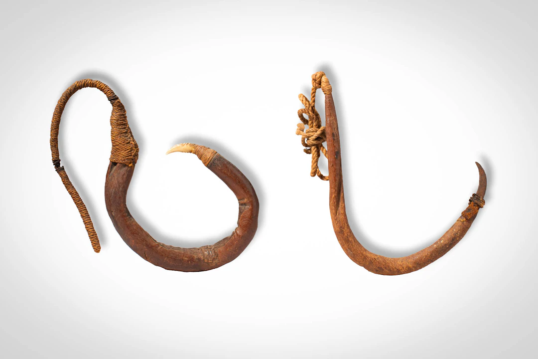 TWO MAORI FISH HOOKS