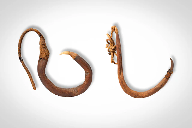 TWO MAORI FISH HOOKS