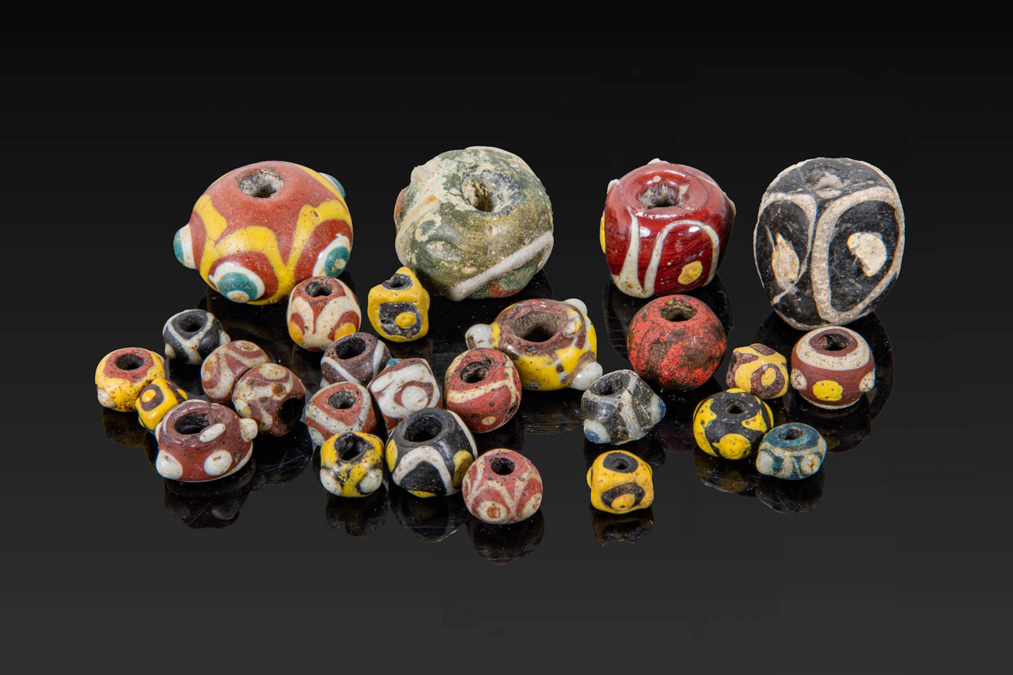 LARGE COLLECTION OF BYZANTINE AND ISLAMIC GLASS BEADS