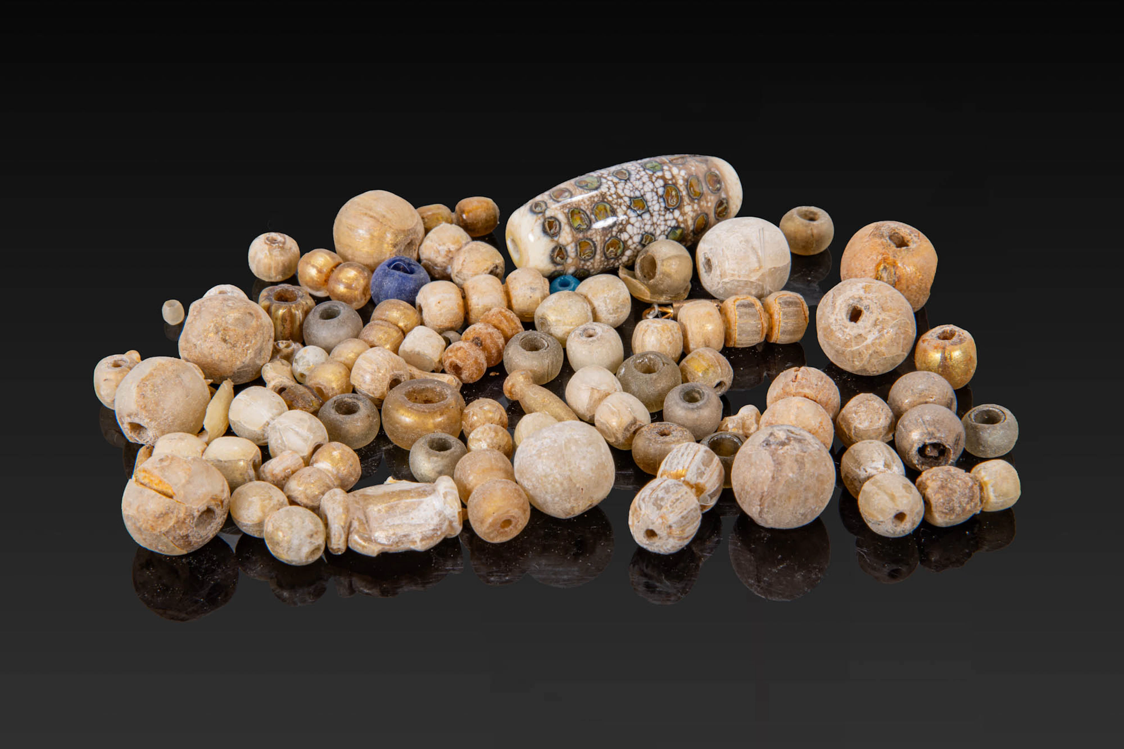 LARGE COLLECTION OF VIKING GOLD LEAF GLASS BEADS