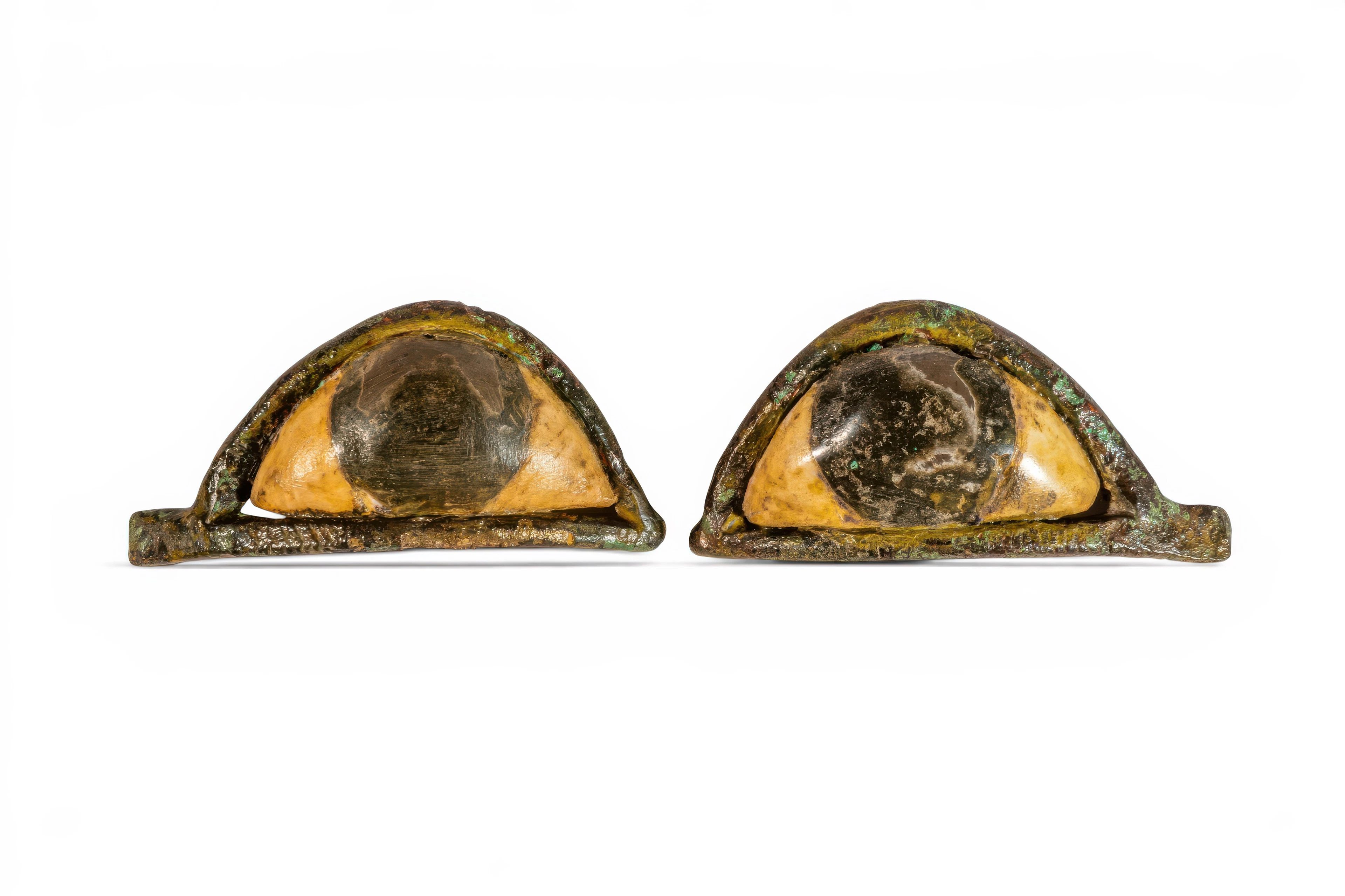 PAIR OF EGYPTIAN BRONZE AND STONE SARCOPHAGUS EYES