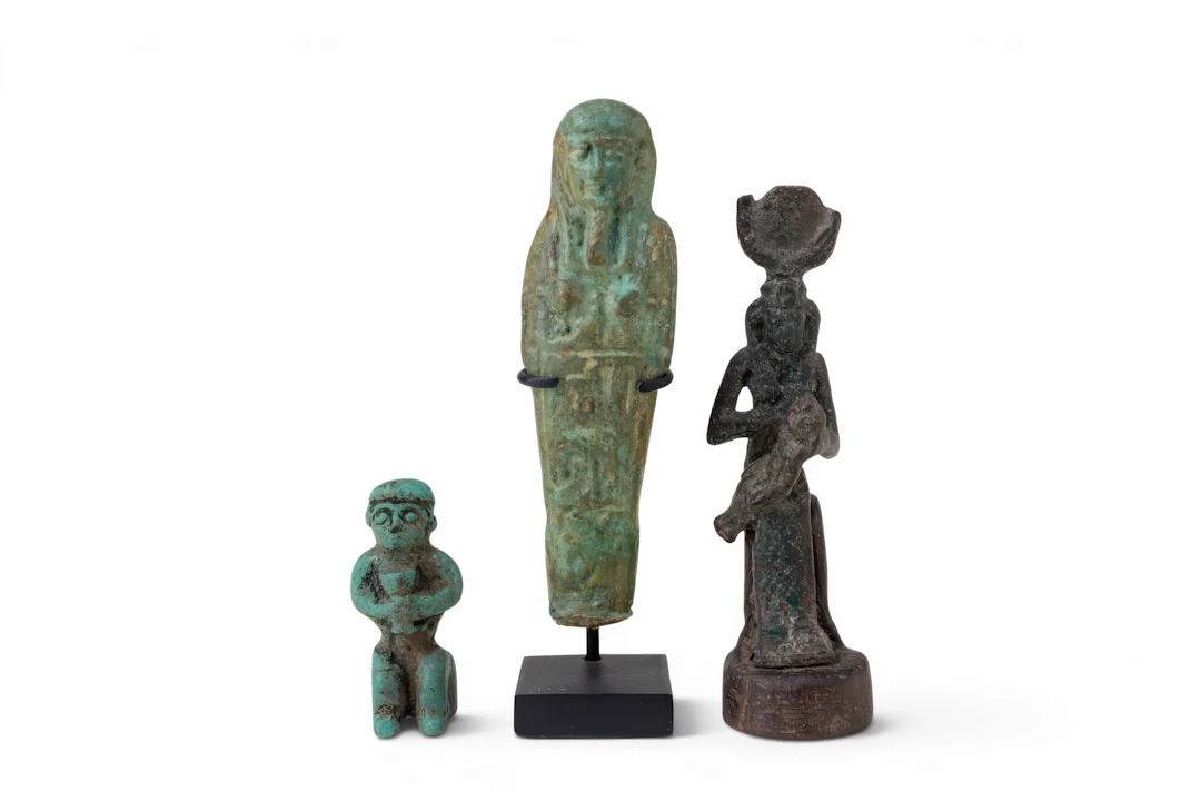 COLLECTION OF EGYPTIAN BLUE EGYPTIAN, FAIENCE AND BRONZE FIGURINES