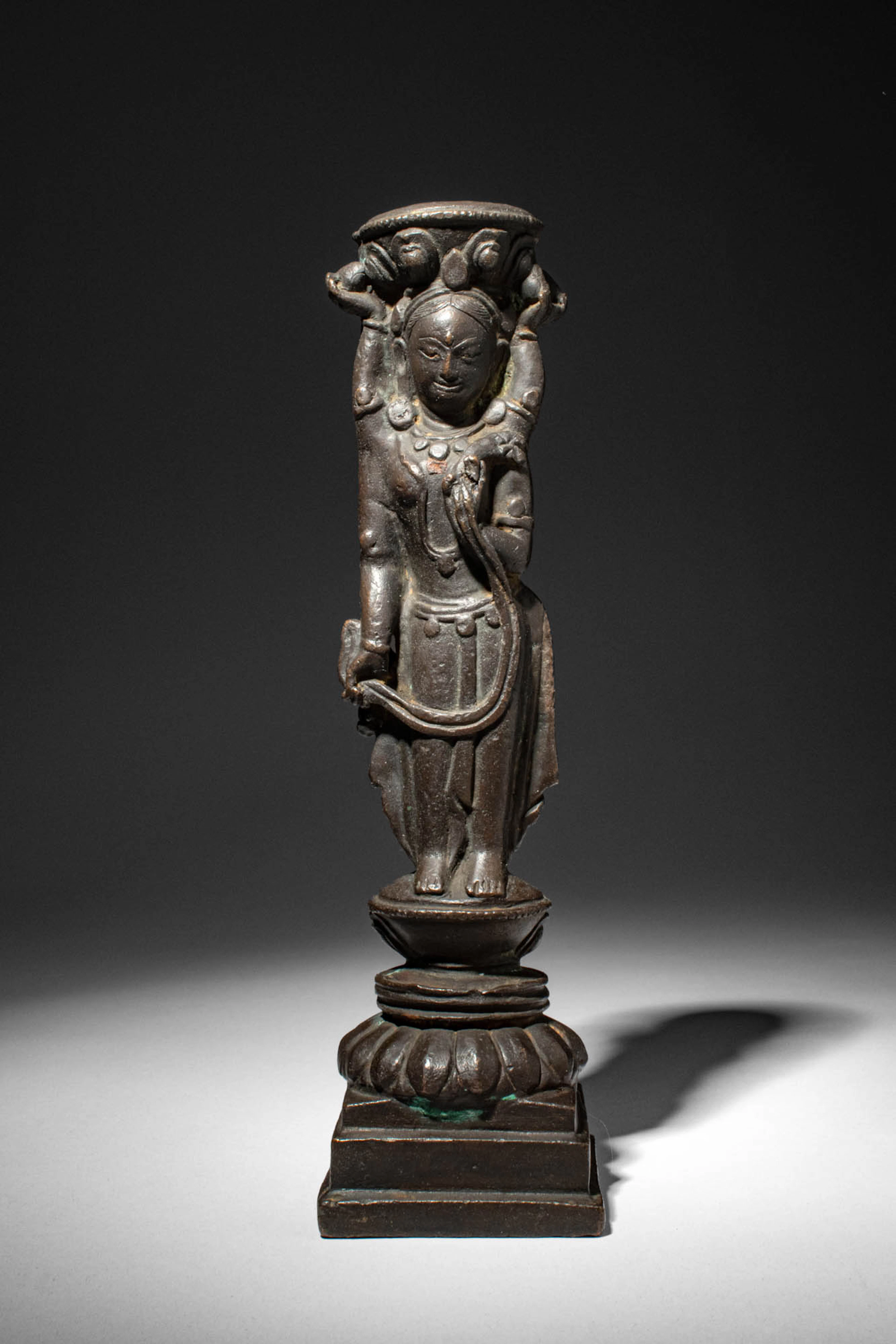 TIBETAN COPPER ALLOY COLUMN SUPPORT DEPICTING AN OFFERING GODDESS