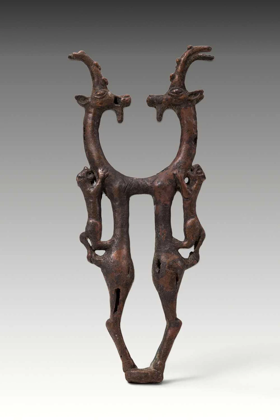 BRONZE AGE BRONZE SCEPTRE HEAD WITH IBEXES ATTACKED BY LIONS