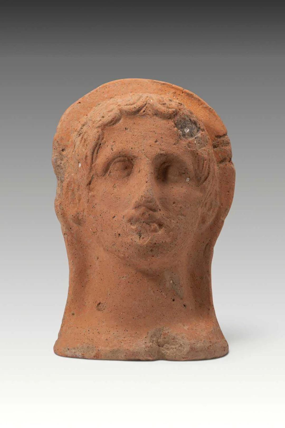 LARGE ETRUSCAN TERRACOTTA VOTIVE HEAD