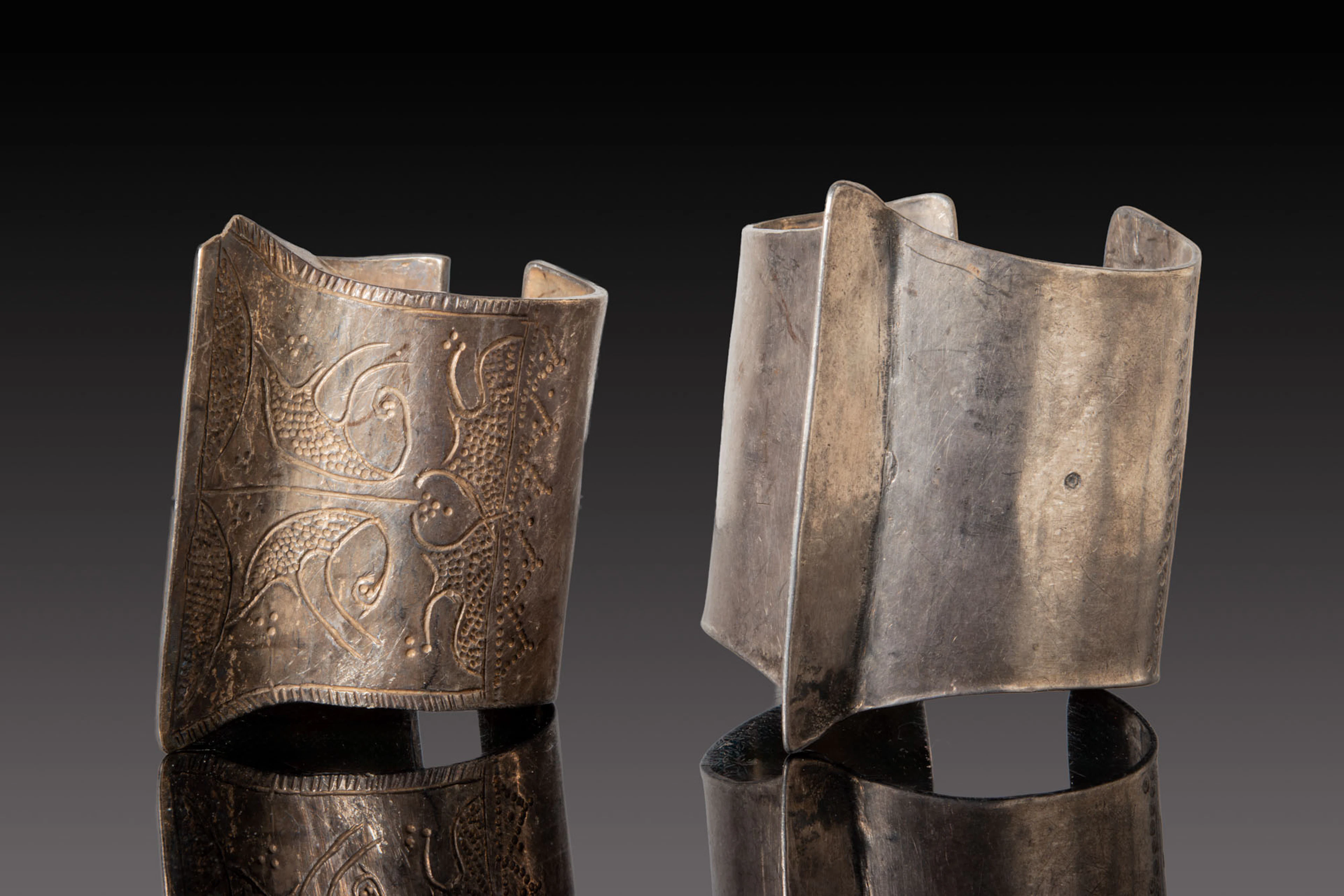 PAIR OF SELJUK SILVER BRACELETS WITH GEOMETRIC AND FLORAL MOTIFS