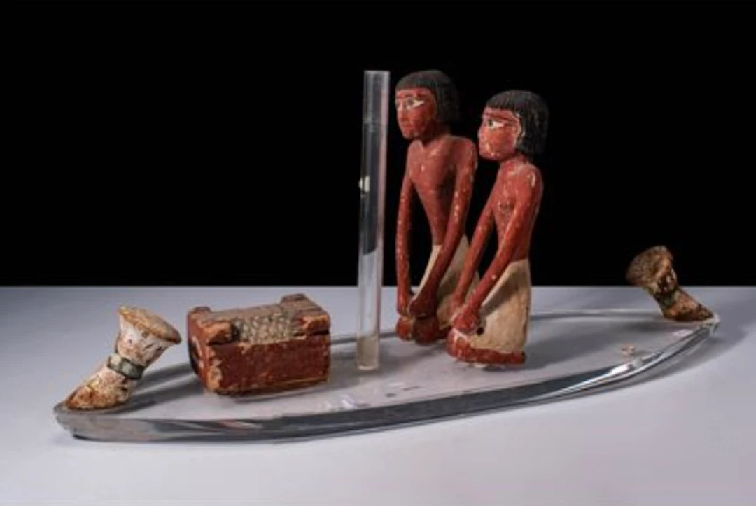 EGYPTIAN WOODEN FIGURINES FROM A CEREMONIAL BOAT