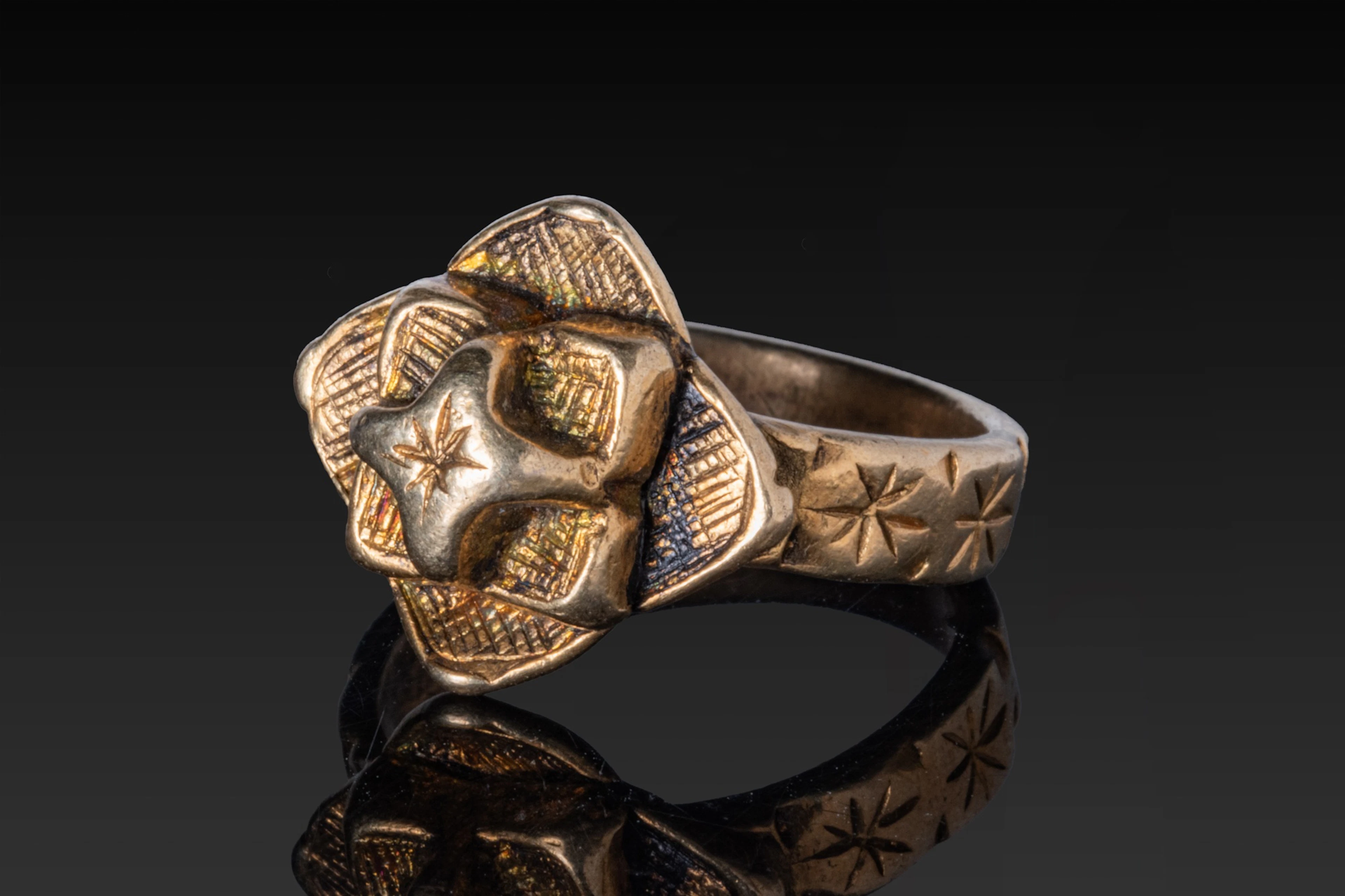 MEDIEVAL SILVER-GILT RING WITH ENGRAVED STAR