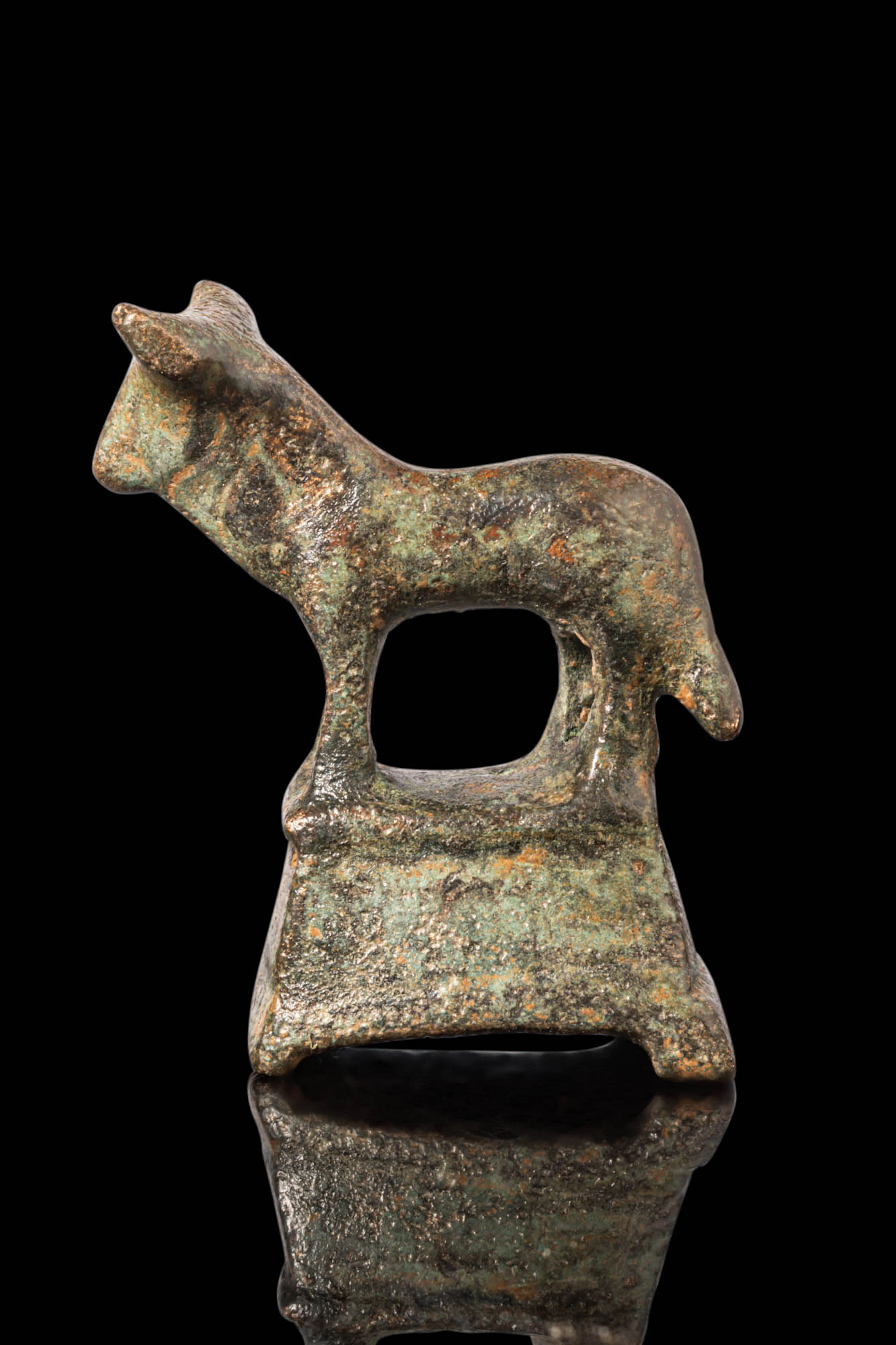 ROMAN BRONZE FIGURINE OF BULL ON PODIUM