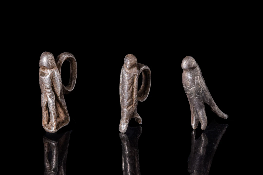 COLLECTION OF ROMAN SILVER EAGLE PENDANTS