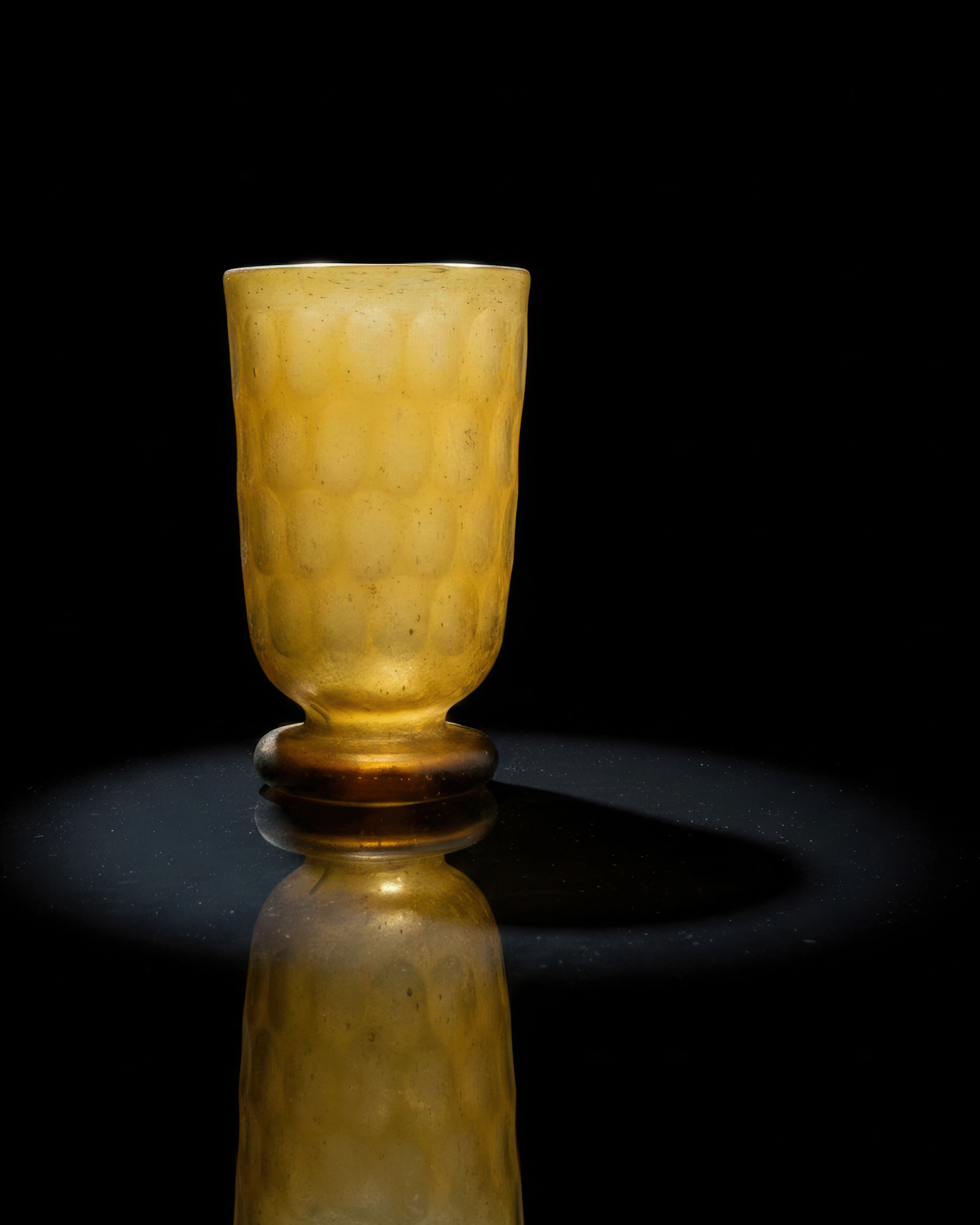 SASSANIAN AMBER CUT GLASS BEAKER