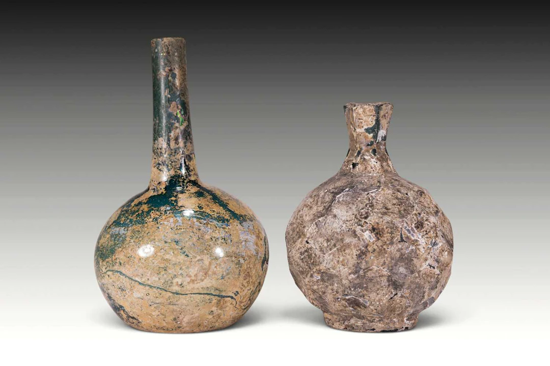 PAIR OF UMAYYAD GLASS BOTTLES