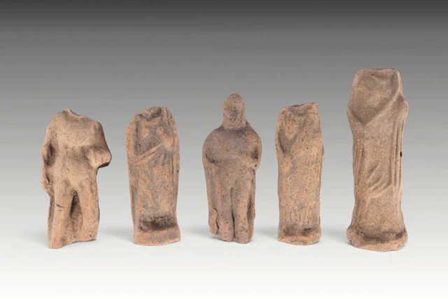 COLLECTION OF HELLENISTIC TERRACOTTA FIGURINES FROM A TEMPLE