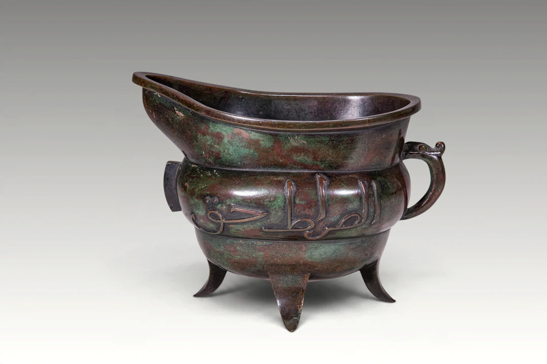 CHINESE BRONZE EWER WITH ARABIC SCRIPT