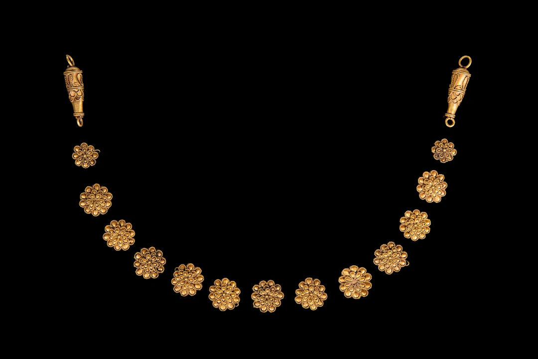 RARE HELLENISTIC GOLD NECKLACE WITH FLORAL DECORATION