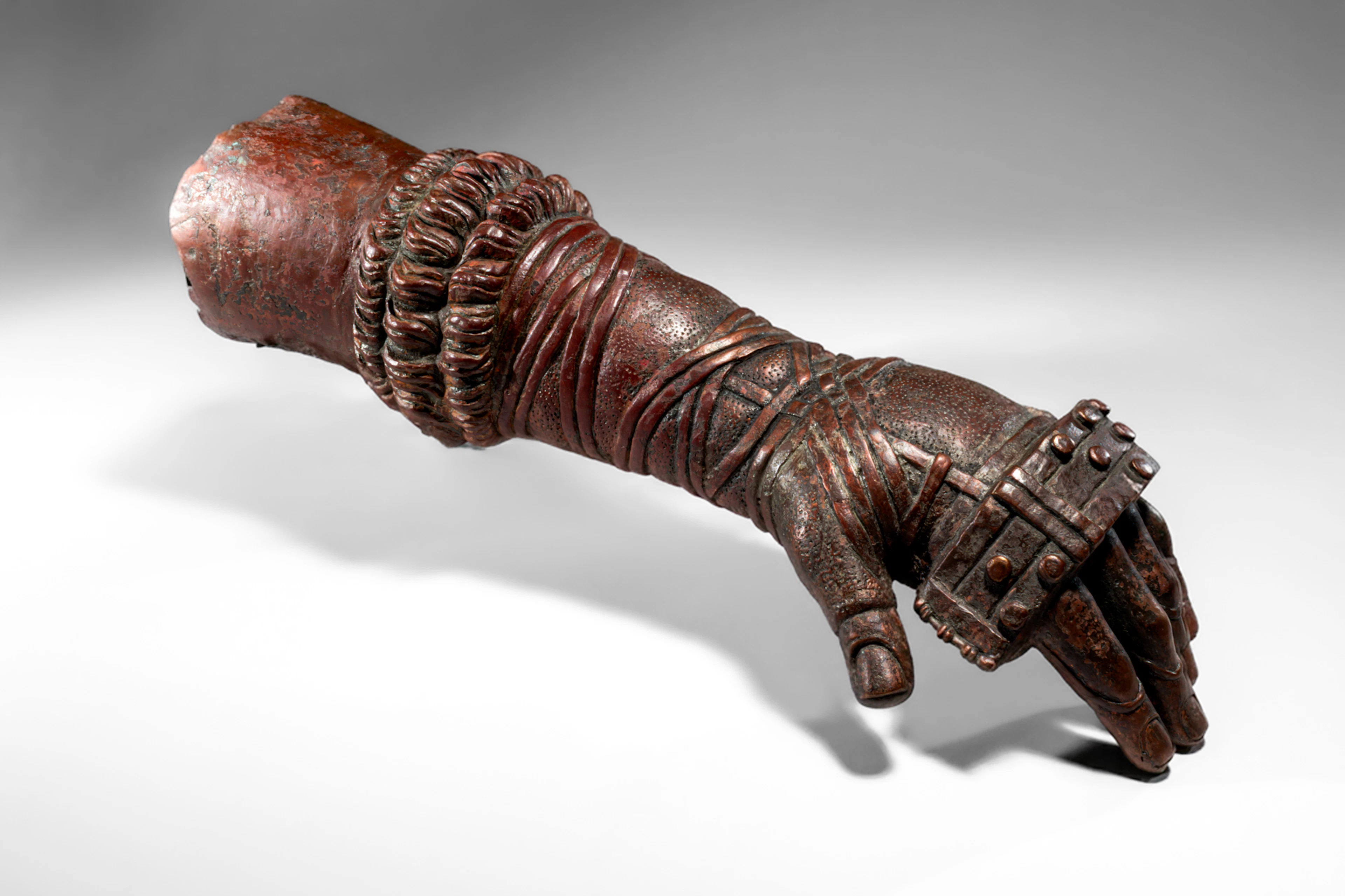 HELLENO-ROMAN BRONZE LEFT FOREARM OF A BOXER WEARING A CAESTUS