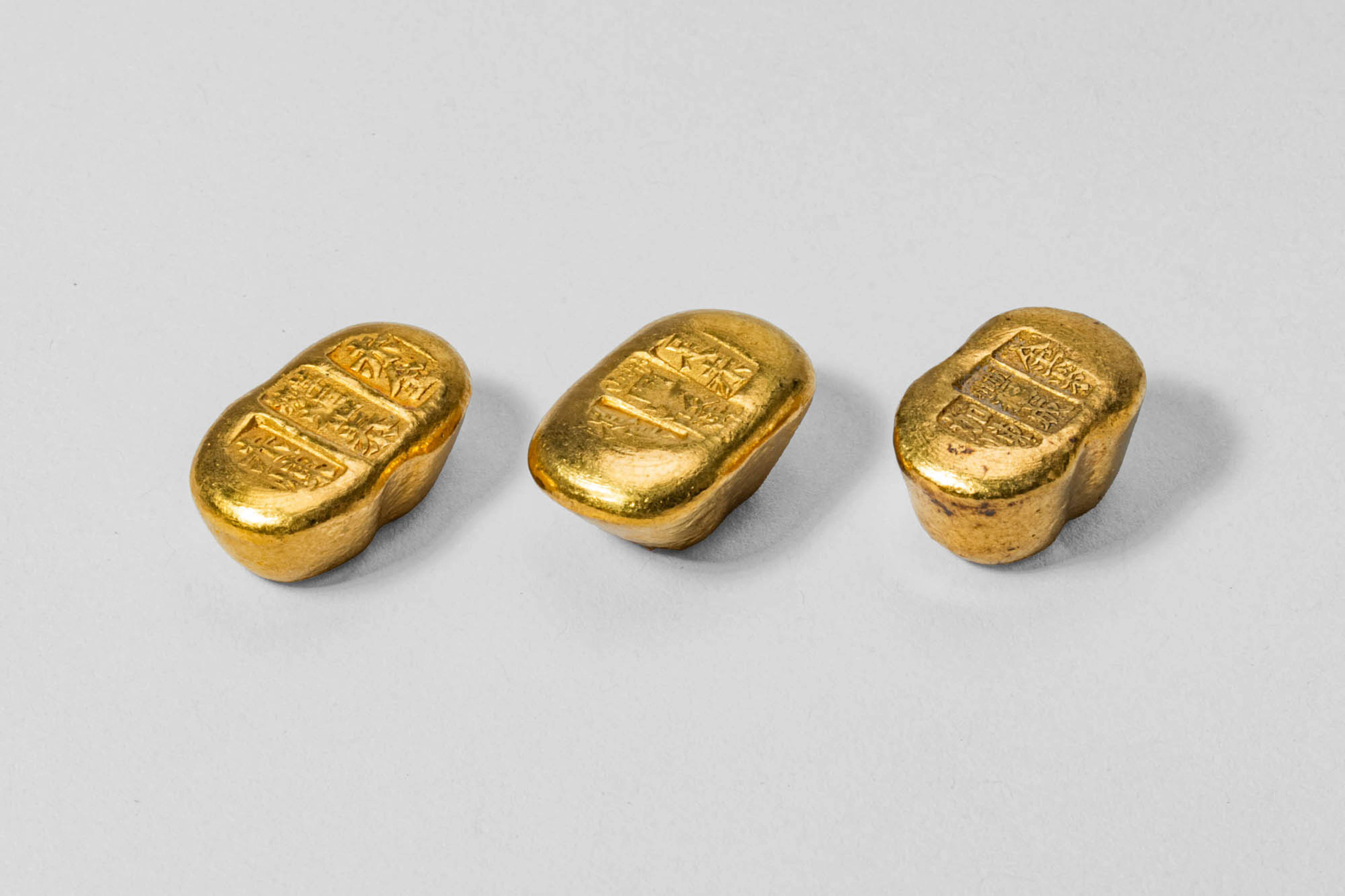 THIRD CHINESE GOLD PEANUT INGOTS, 93.7 GRAMS