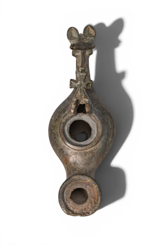 BYZANTINE BRONZE OIL LAMP WITH HORSE-SHAPED HANDLE AND CROSS